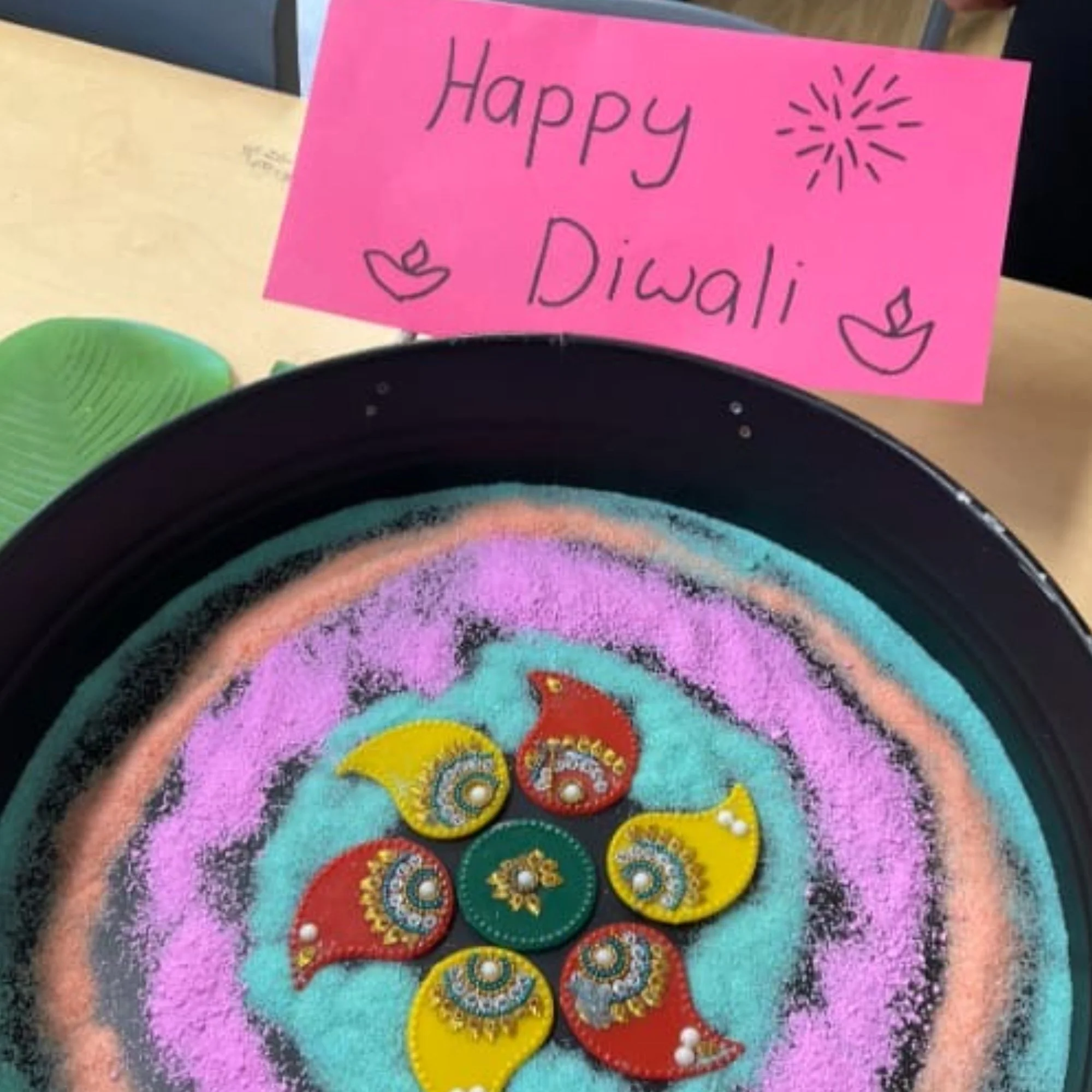 🌟 Diwali Fun at Big Bear Academy Macquarie Park! 🌟

This week, the children discovered the beauty of Diwali &mdash; the Festival of Lights!

They used colourful sand to design vibrant Diwali patterns, exploring creativity while learning about the r