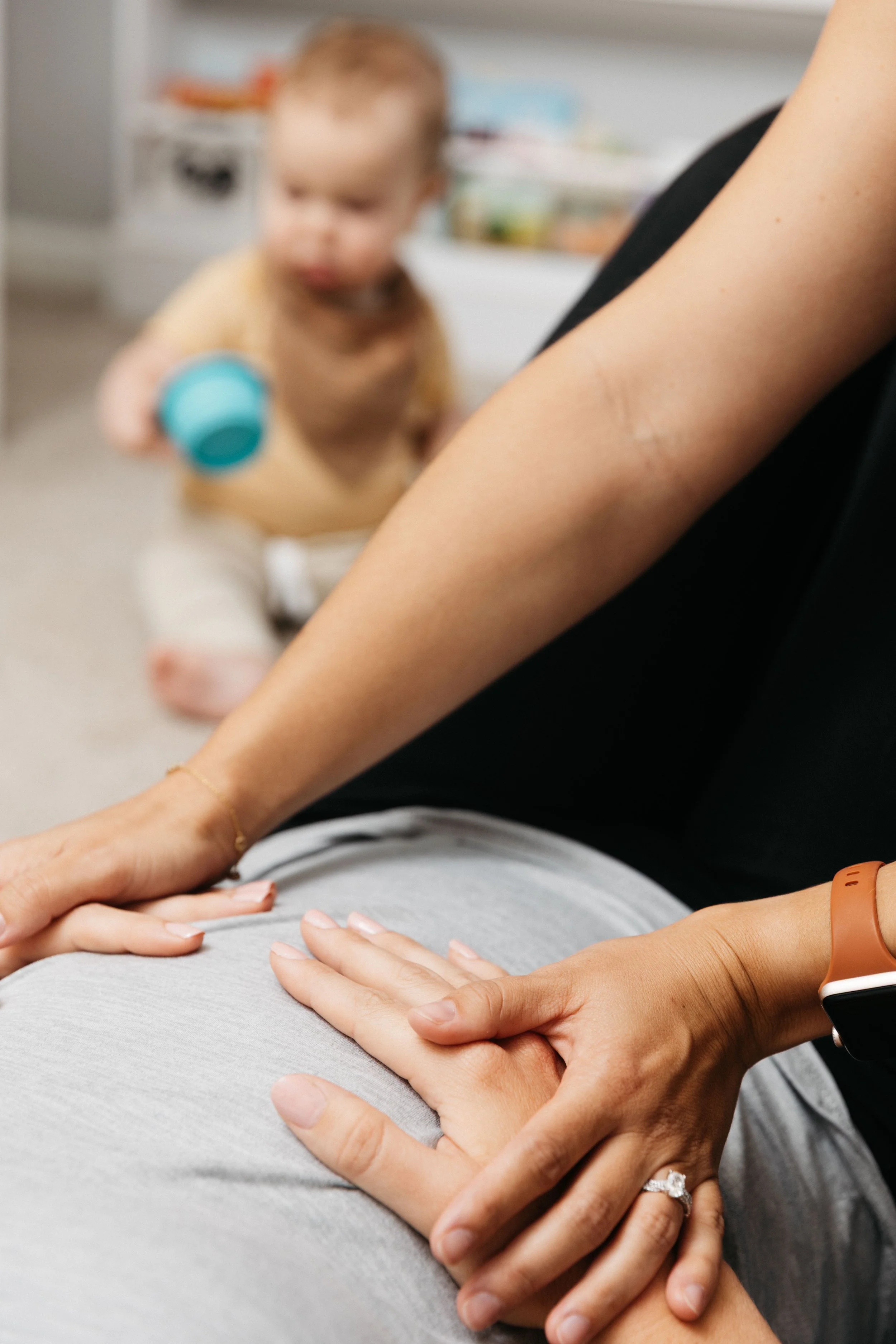 hands on pelvic floor therapy to decrease pain, leaking in postpartum with baby present during in-home session in charleston, SC