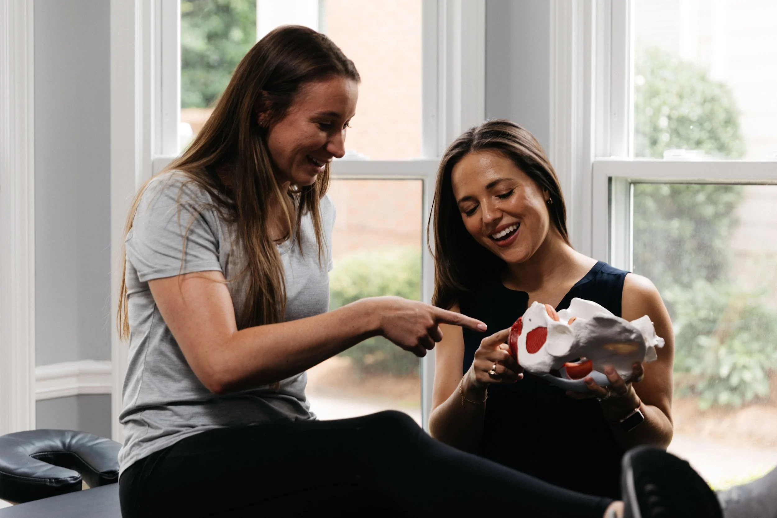 sarah kate orton pelvic floor therapist in charleston, sc educates woman on pelvic anatomy to decrease pain and increase pleasure with sex and intimacy