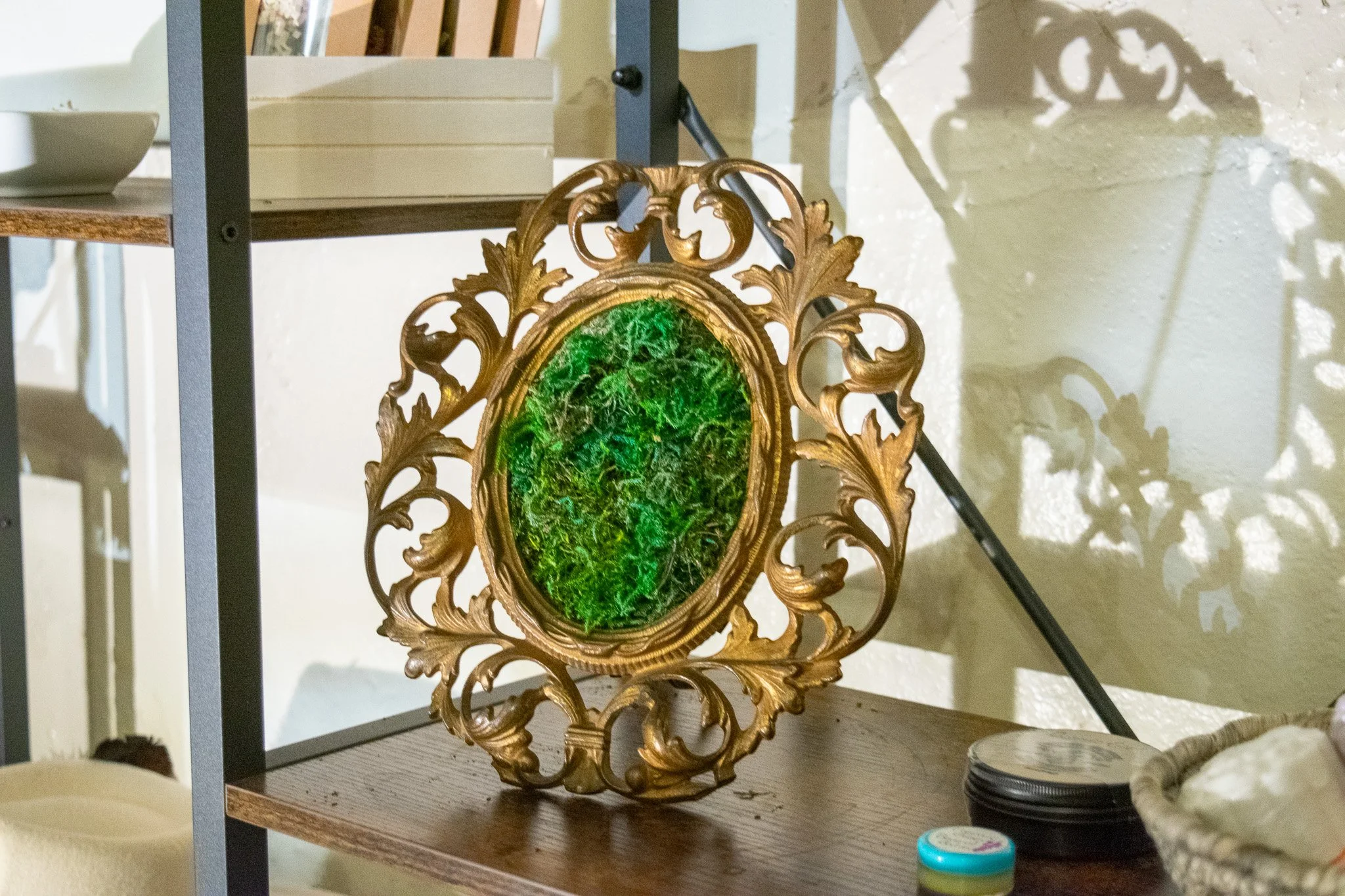 Brass moss art