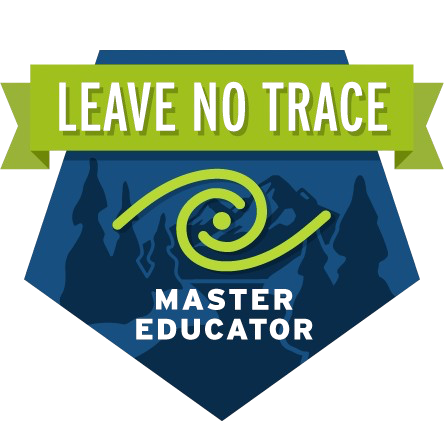 Badge with a green banner that says "Leave No Trace," a green spiral arrow, and the words "Master Educator" underneath.