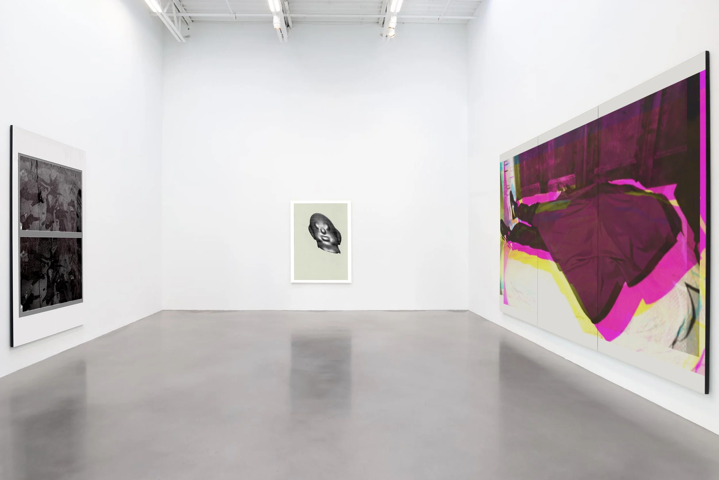 An art gallery with white walls and concrete floor displaying three modern artworks: a large purple and pink abstract painting on the right, a black and white portrait of a head in the center, and a monochrome collage on the left.