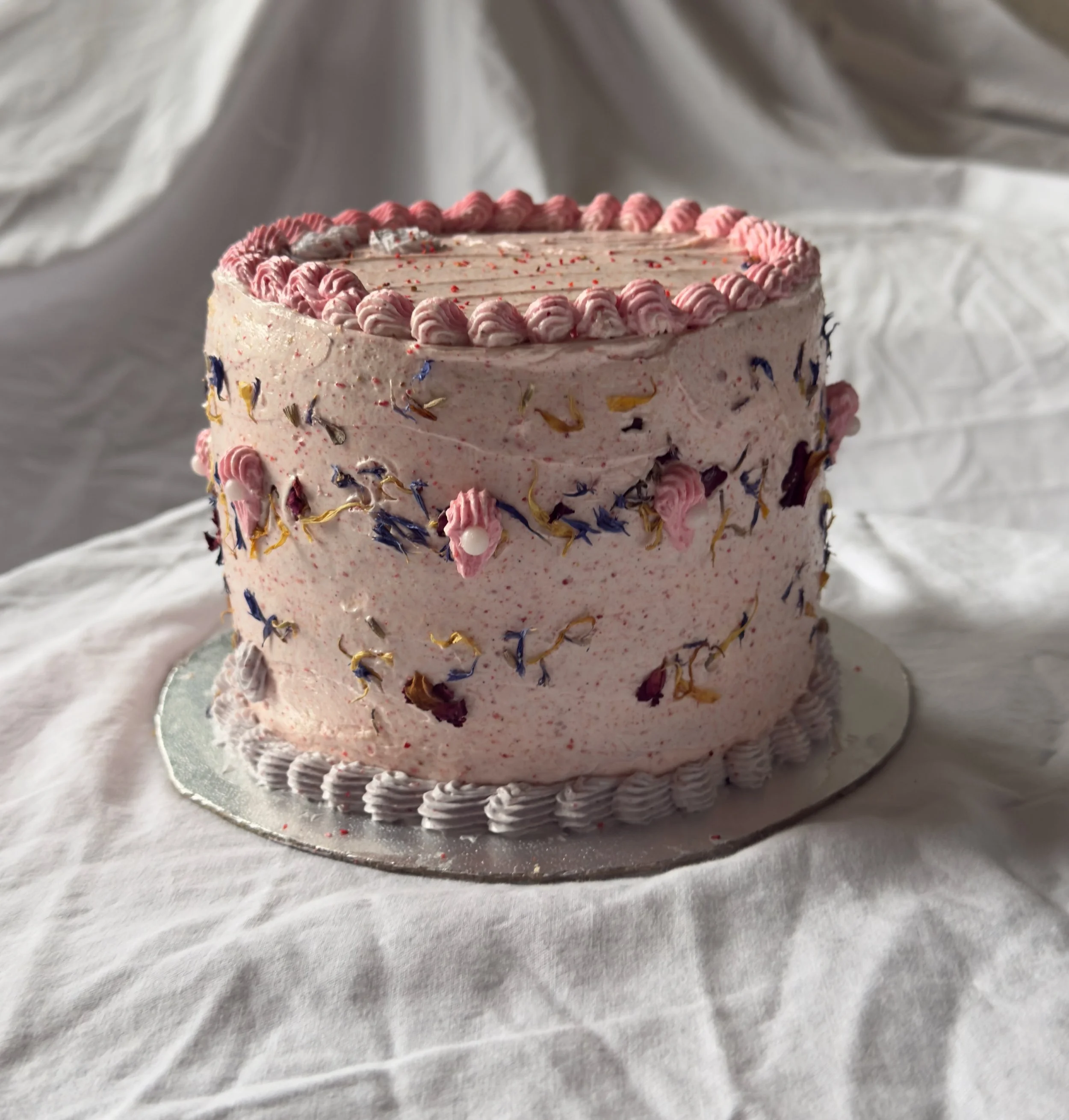 lemon cardamom sponge + strawberry pastry cream + tonka-rose buttercream