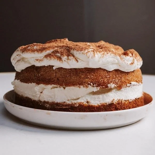 warm vanilla sponge + mascarpone whip + espresso soak