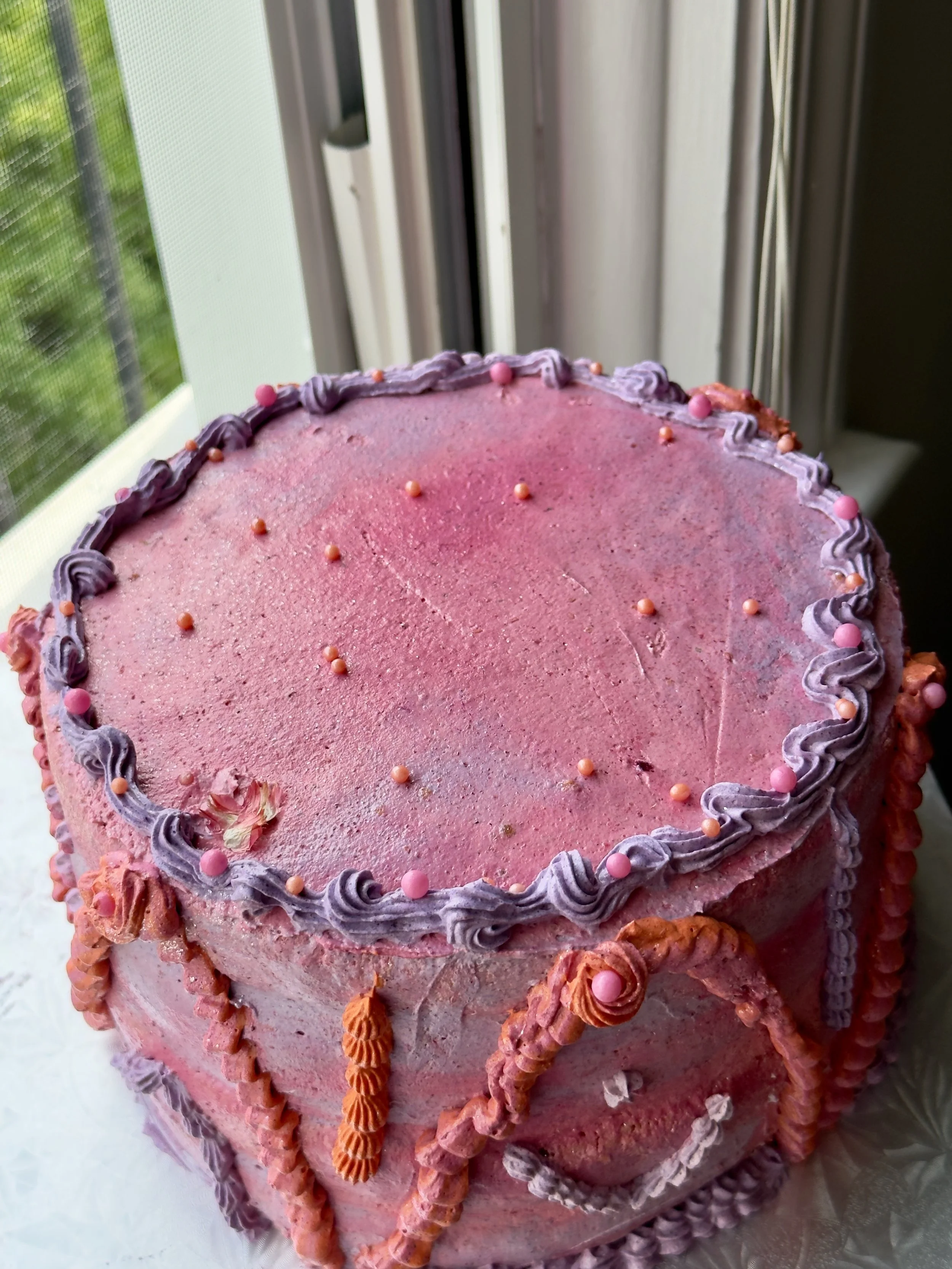 orange sugar chiffon + passion fruit curd filling + raspberry buttercream