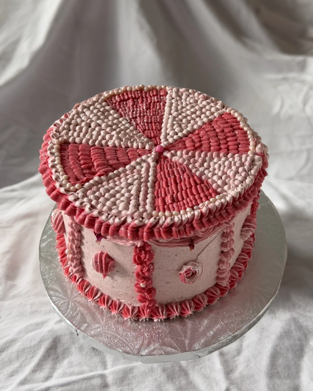 vanilla bean cake + raspberry jam + strawberry rose swiss meringue buttercream