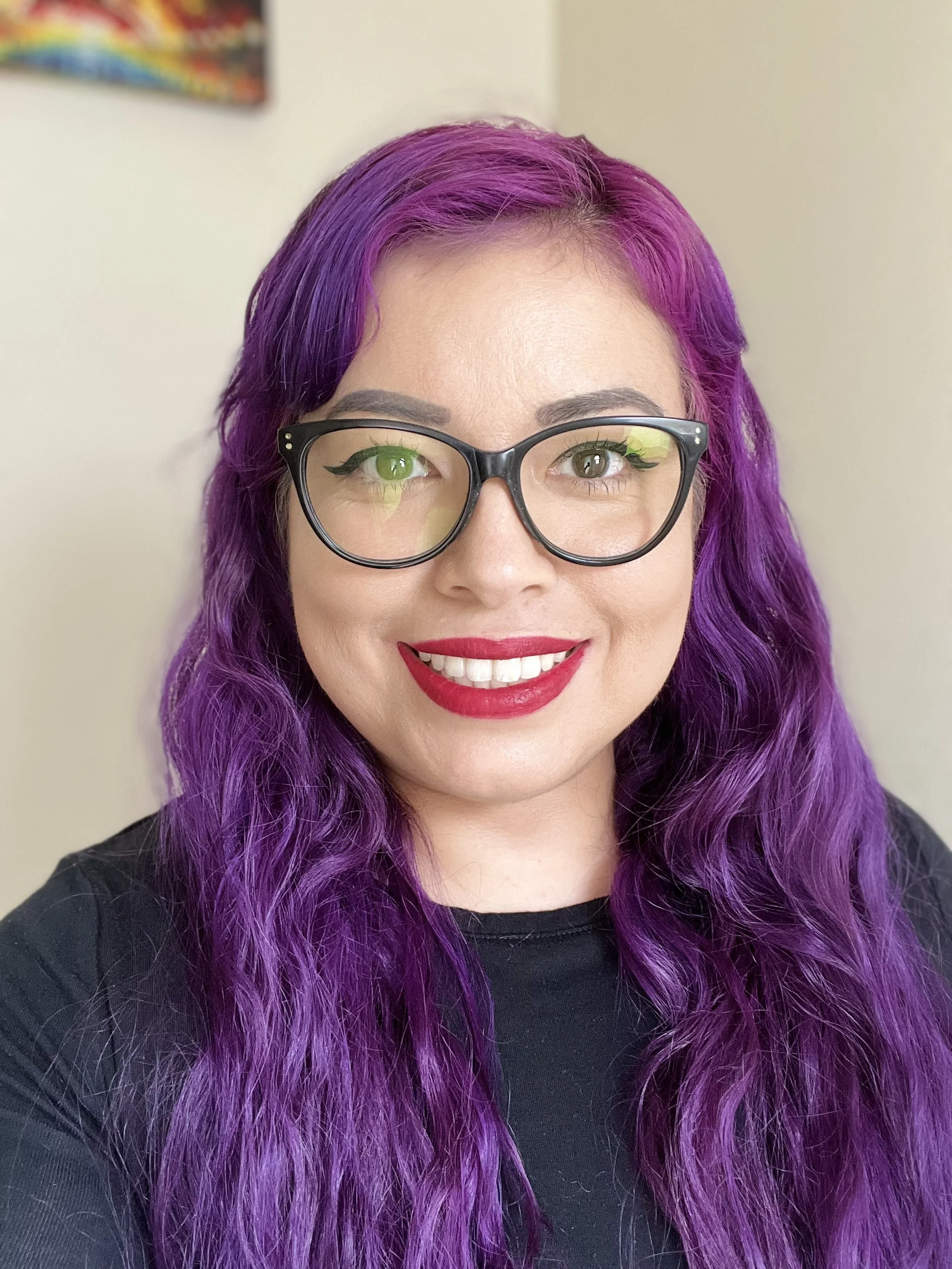 Johanna Moreno, a bilingual Latina therapist providing virtual therapy for first-gen adults in California.