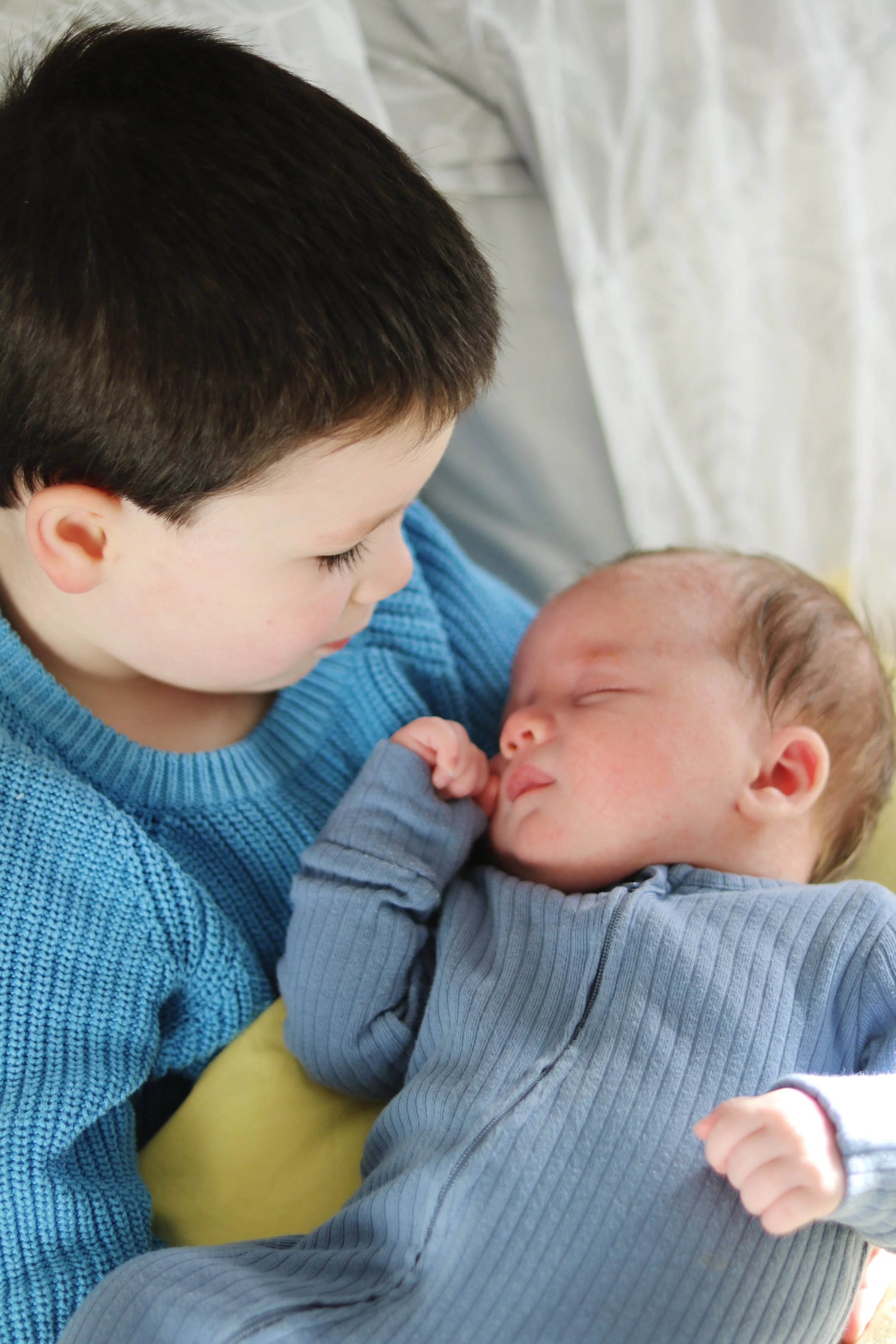 Two siblings during a Glasgow newborn photography session