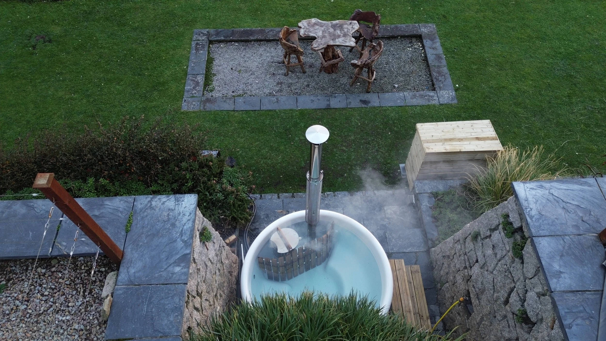 Wood-fired hot tub with sea views