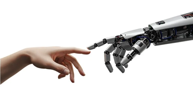 Human hand reaching towards robotic hand, isolated on white background.