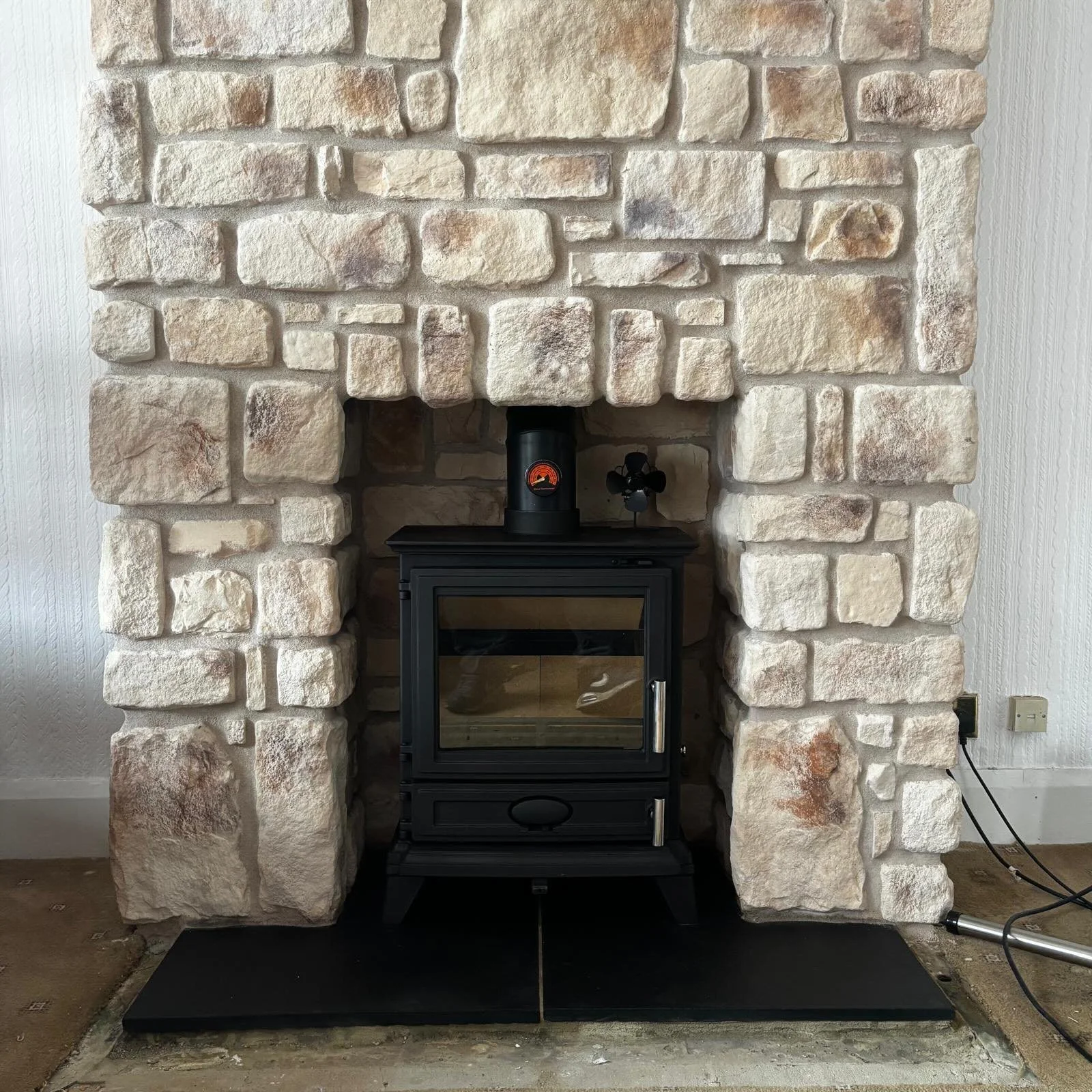 🔥 NEW INSTALL COMPLETE! 🔥

We&rsquo;re absolutely thrilled with this stunning new stove installation!

We&rsquo;ve installed a beautiful Ecosy wood-burning stove, complete with a sleek black stone hearth and a full stone cladding on the chimney bre