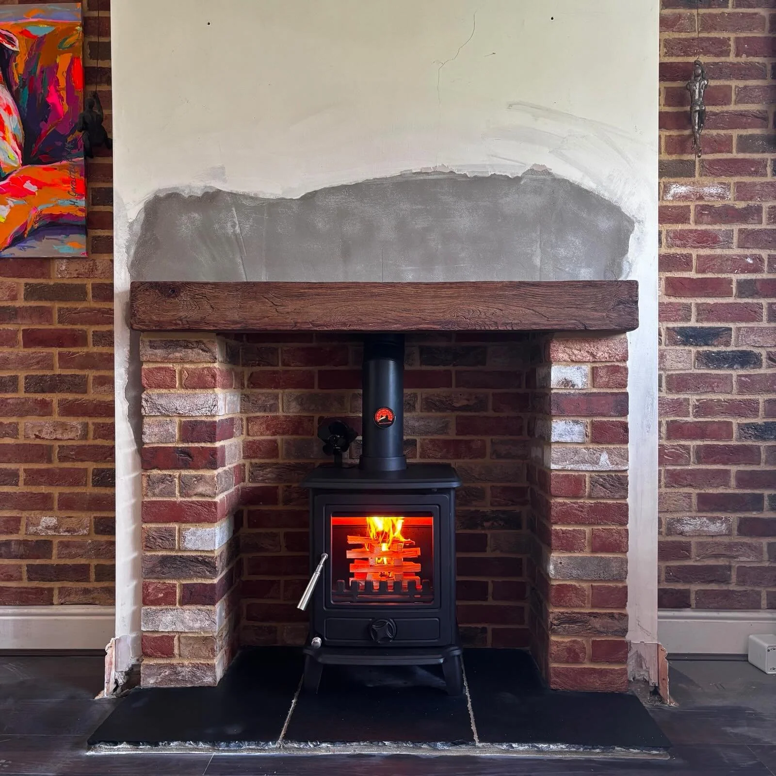 🔥 Another stunning fireplace transformation complete! 🔥
Featuring the Cast Tec Puma 5 &mdash; a sleek 5kW cast-iron multi-fuel stove with a large airwash glass window that keeps the view crystal clear.

Installed with: 
🪵 Non-combustible beam
🧱 B