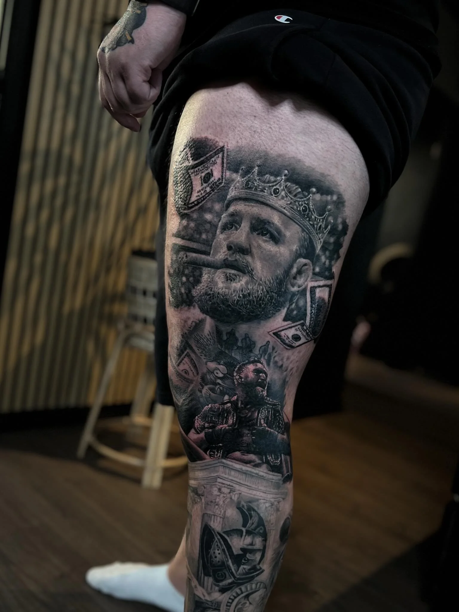 Progress on this leg! Calf not done by me. @thenotoriousmma 🍀 Most of it is healed, added couple of flying dollar bills and the tiny Conor holding two belts is mighty fresh looking, but we&rsquo;ll just have to wait for a bit to let it heal. Very ve