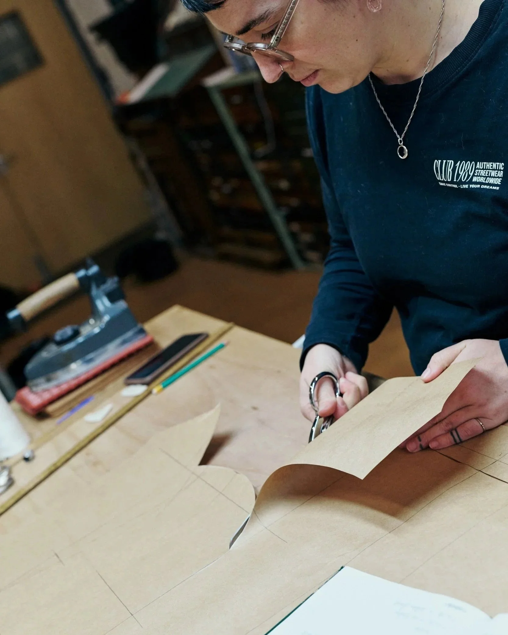 close up image of a sewing machine \embroidering on fabric
