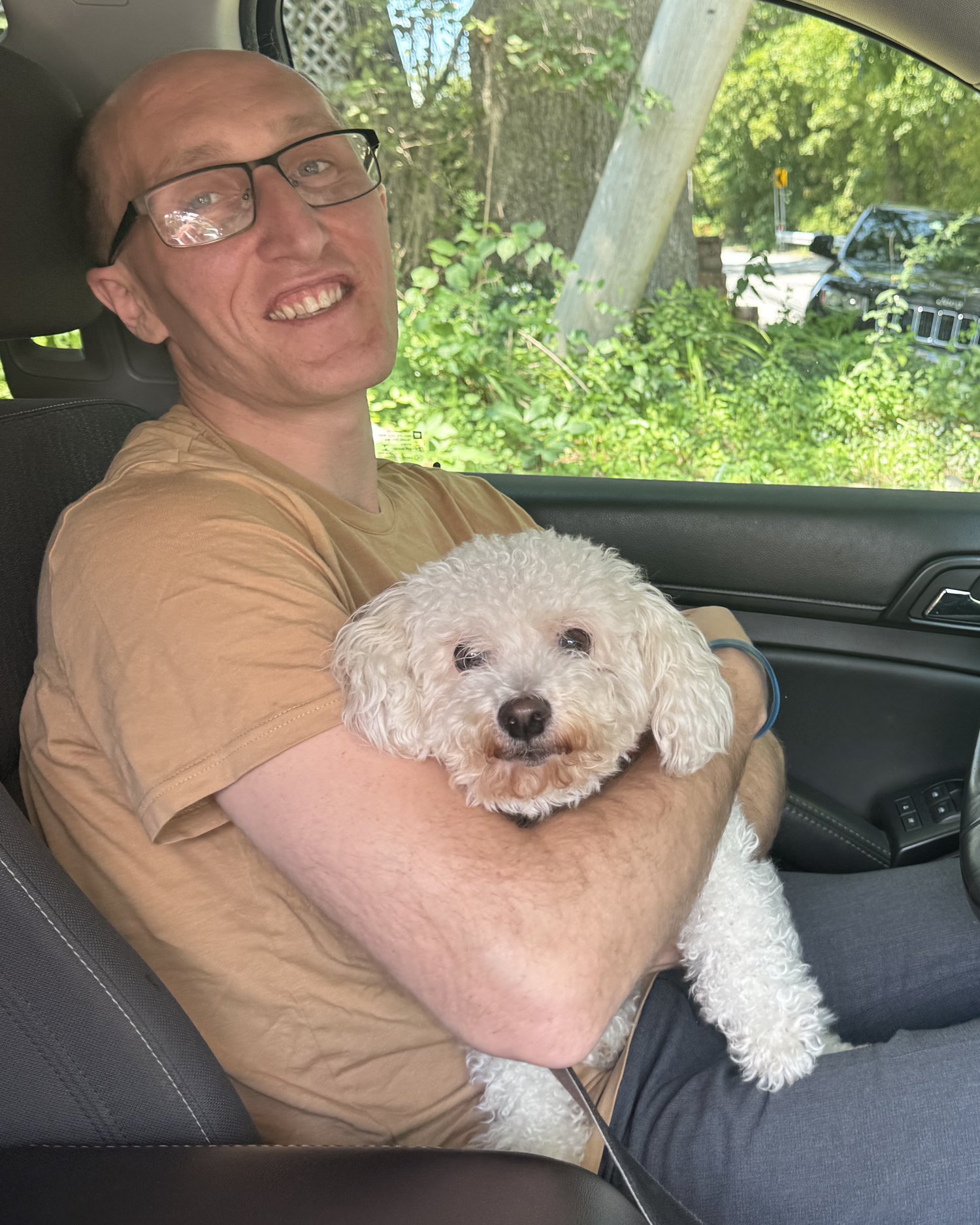 William McGuire, Massachusetts estate planning attorney, with his dog Miley.