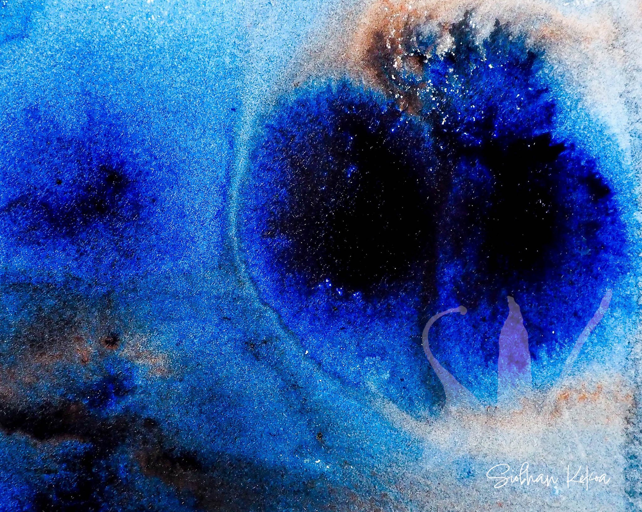 Abstract Celestial Watercolor and liquid Acrylic Painting by artist Siobhan Kekoa. Painting depicts a sort of nebula, with watery mixtures of very dark and light blue, with some light brown, tan, and cream colors interspersed throughout. Primary cent