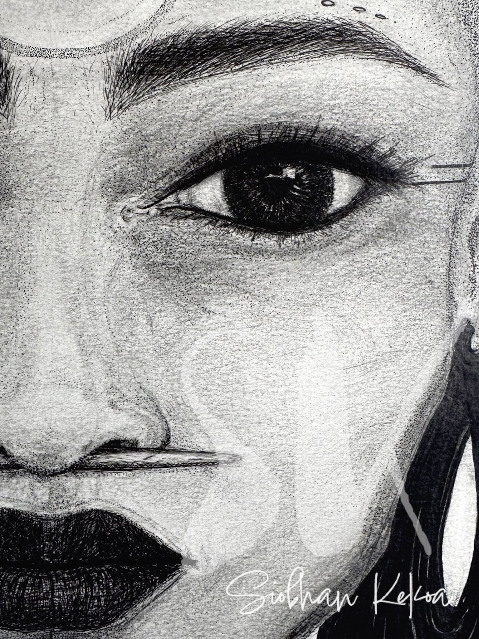 “Awαssísi-Kínαpe ~ Young Warrior". Ink, Graphite, & Charcoal on Paper, 18”x26”. Image shows a close-up detail of the stippling dotwork and ink stroke technique used to create the eyebrows, nose, Traditional bone septum piercing, mouth, and Tradition