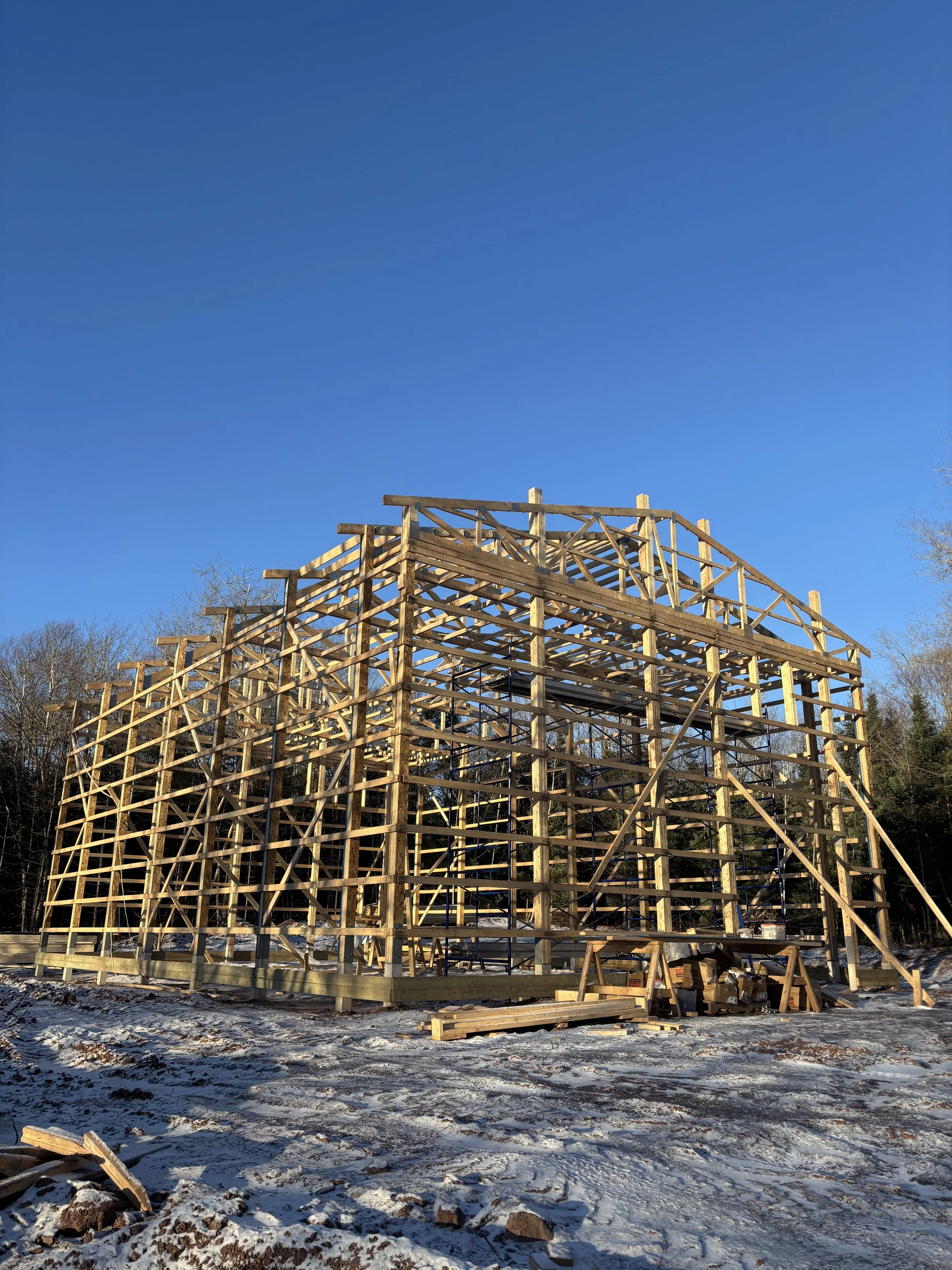 Oranssi technician working on a roof project