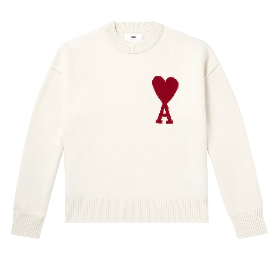 Sweat-shirt blanc AMI PARIS avec un cœur rouge et la lettre A brodés dessus.