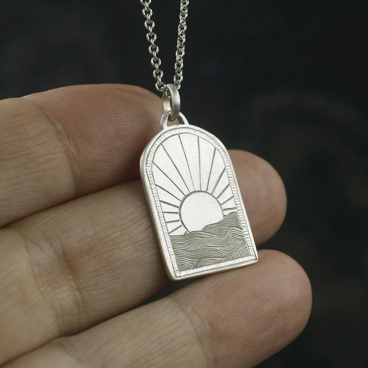 Gravée Portal Arch Sunrise Over Waves Pendant.jpg