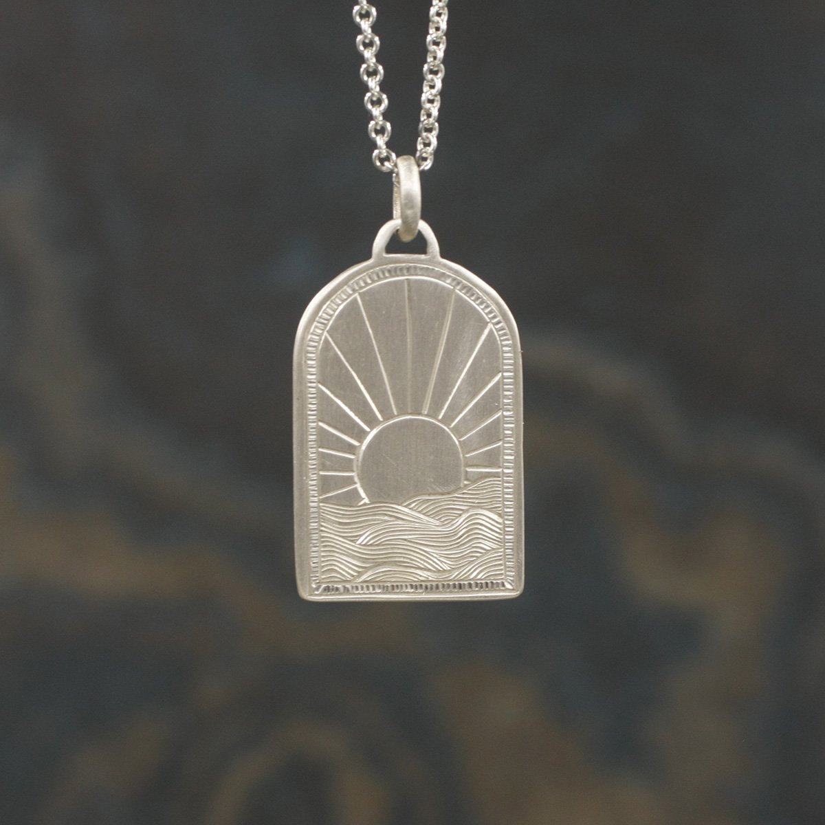 Gravée Portal Arch Sunrise Over Waves Pendant 1.jpg