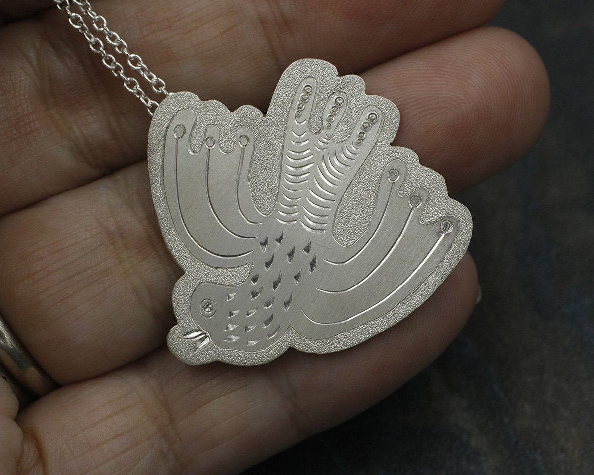 Gravée Swooping Bird Folk Art Style with Dotted Wings Pendant.2.jpg