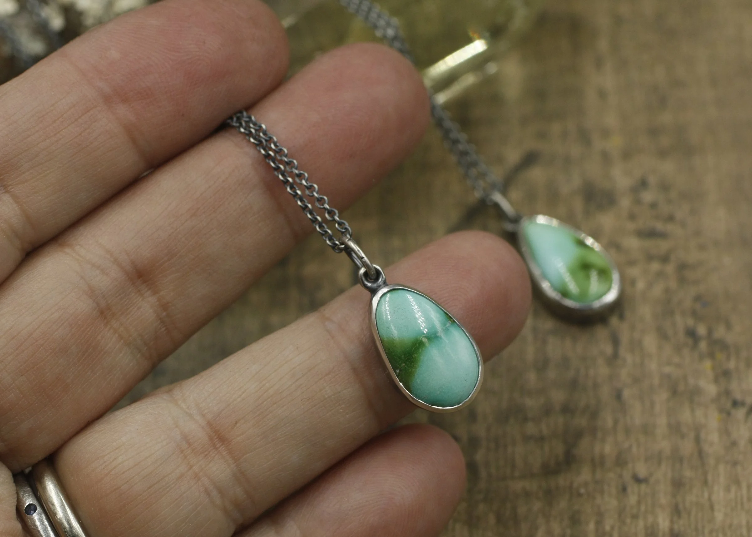 Botanicals Sonora Gold Turquoise Leaf imprint Pendants.jpg