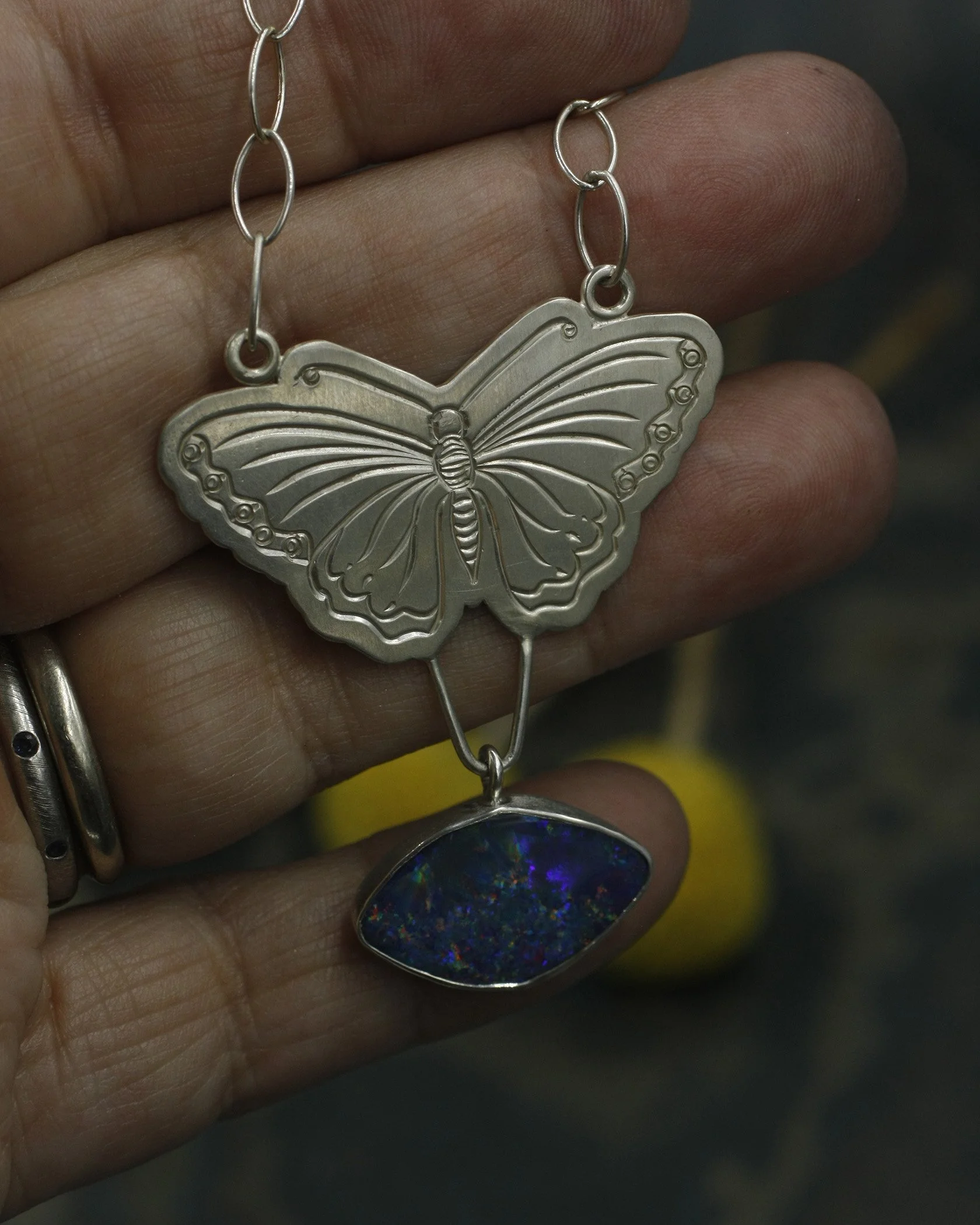 Butterfly Necklace with boulder Opal Football Shape.jpg