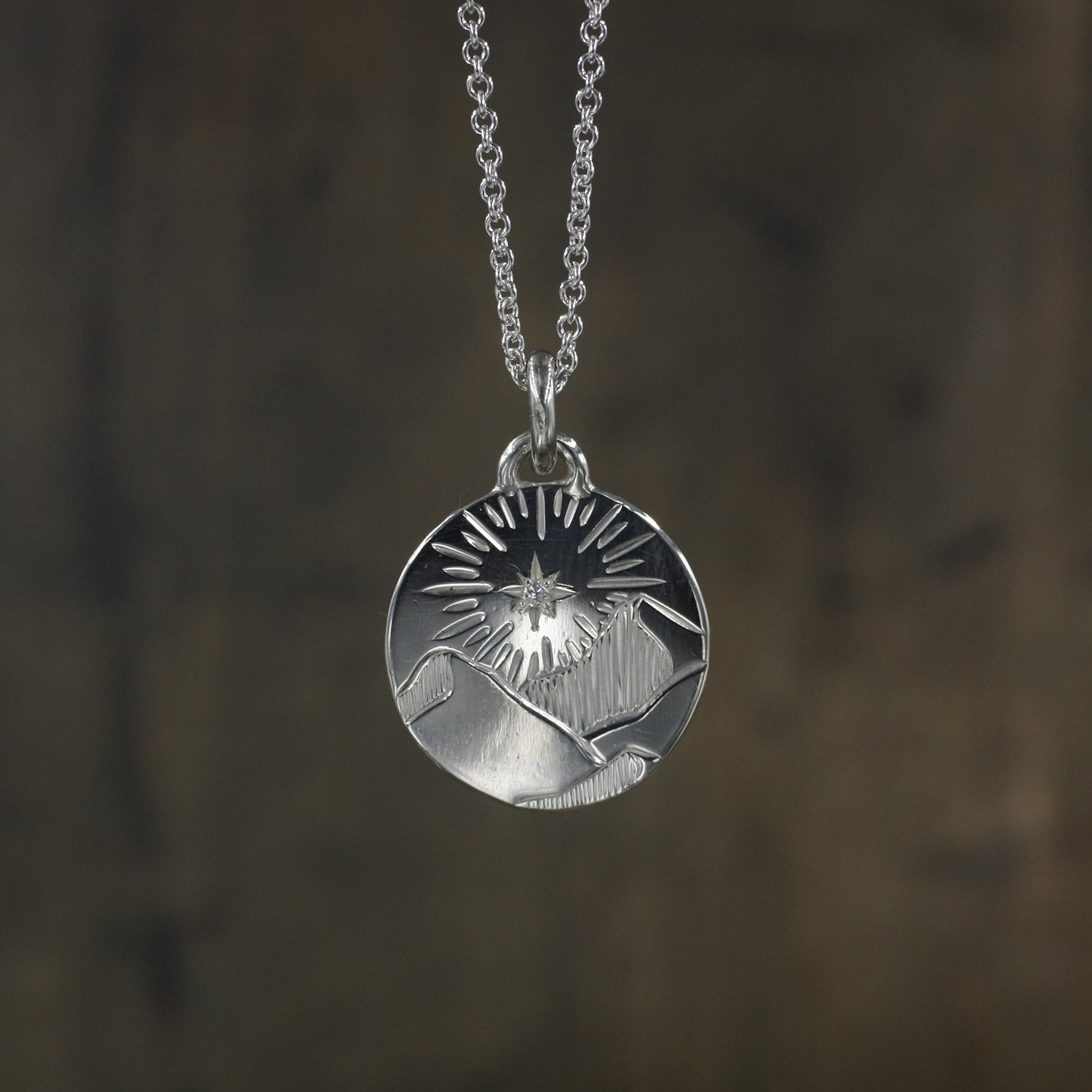 Gravée Snowy Mountains North Star Circle pendant with Diamond.jpg
