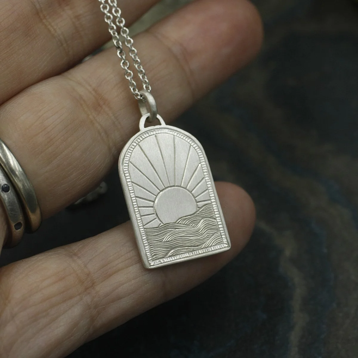 Gravée Portal Arch Sunrise Over Waves Pendant 8.jpg