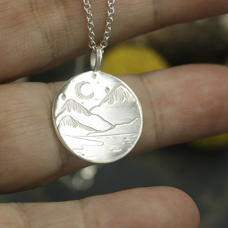 Gravée Snowy Mountains and River Crescent Moon Circle Pendant 2.jpg