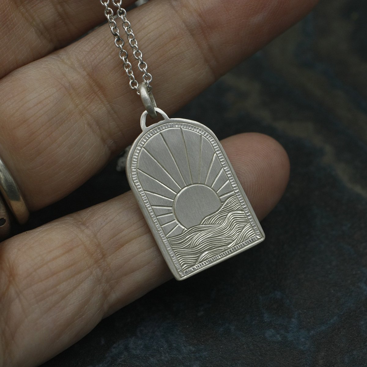 Gravée Portal Arch Sunrise Over Waves Pendant 4.jpg