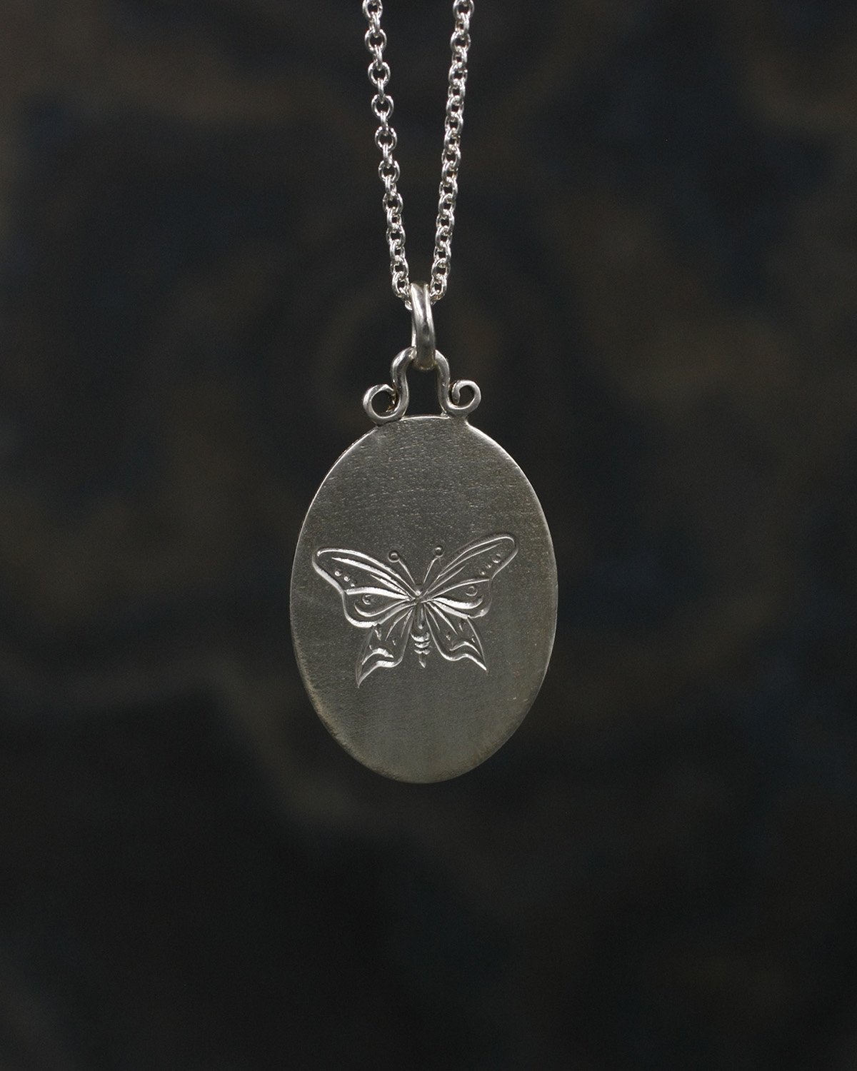 Gravée Linen Texture Butterfly with Crescent Moons Pendant .jpg
