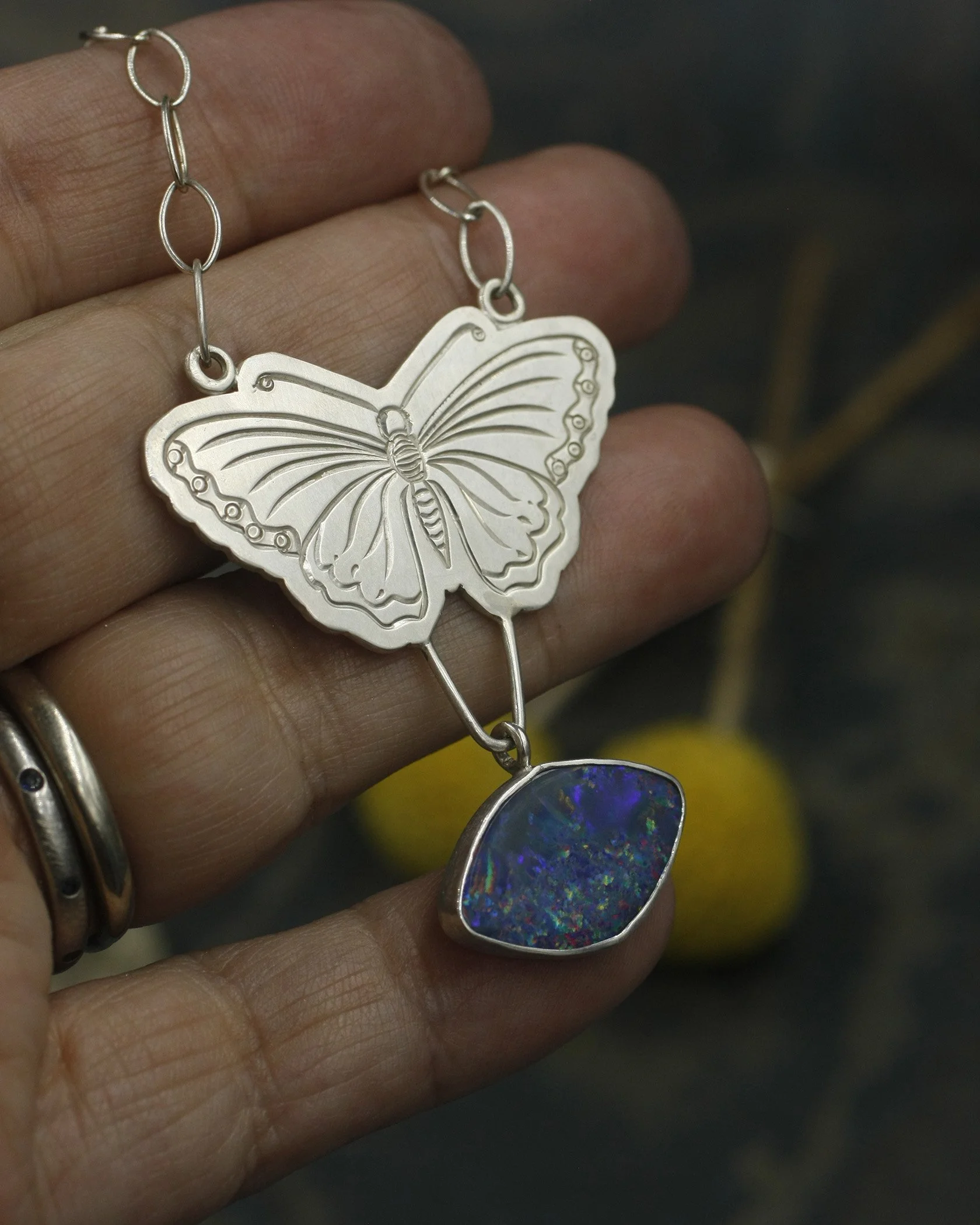 Butterfly Necklace with boulder Opal Football Shape 1.jpg