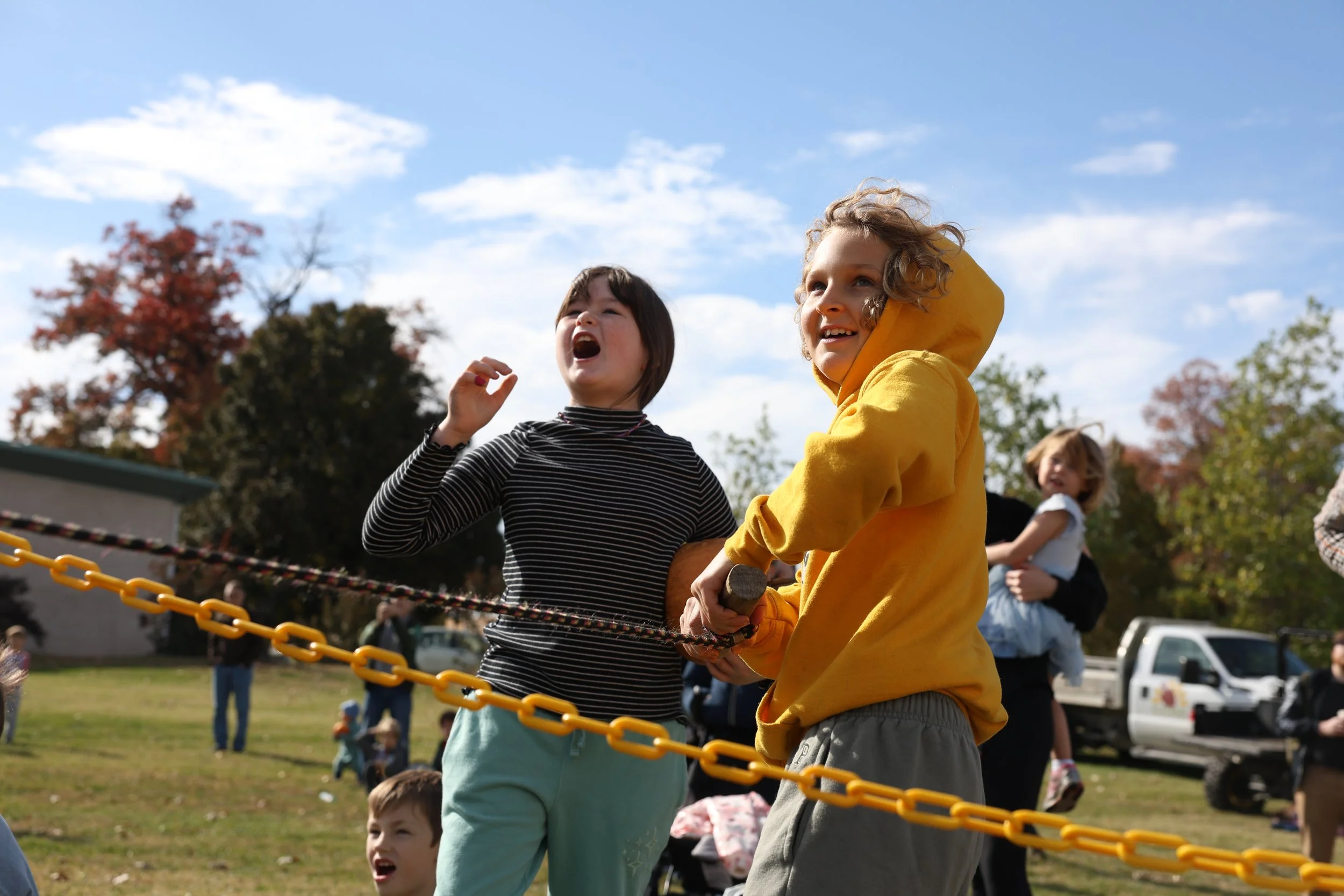 From left, Freda Vair, 9, cheers as
Cameron Weinreich, 9, launches a
pumpkin during the Pumpkin Smash on
Saturday, Nov. 8, 2025, at Columbia’s
Agriculture Park in Columbia. Vair and
Weinreich waited more than 30 minutes for the
pumpkin catapult.