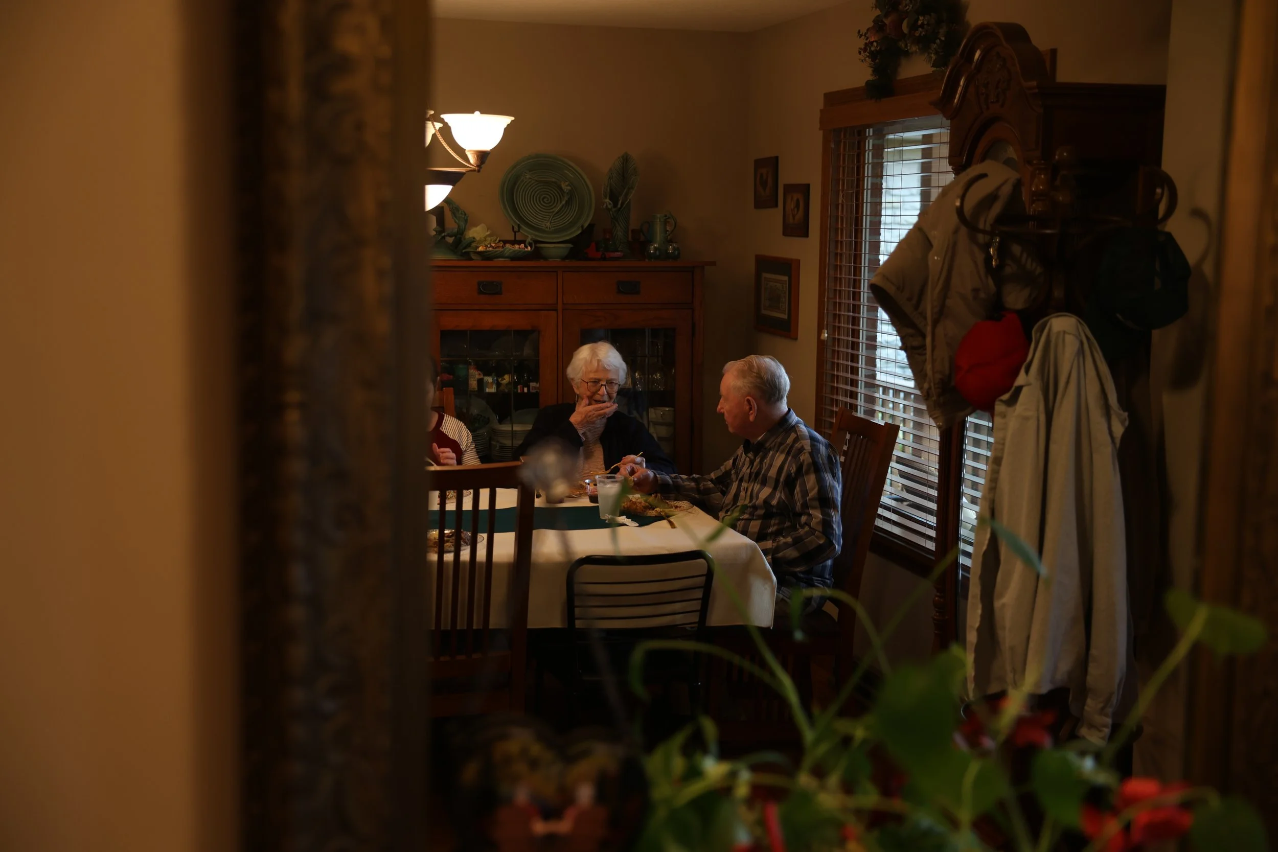 Mary Lou and Daryll Raitt eat their
celebratory lunch on Saturday, Nov. 8,
2025, at their home in Hartsburg. Mary
Lou cooked the bulk of the meal while the
rest of the family brought sides.