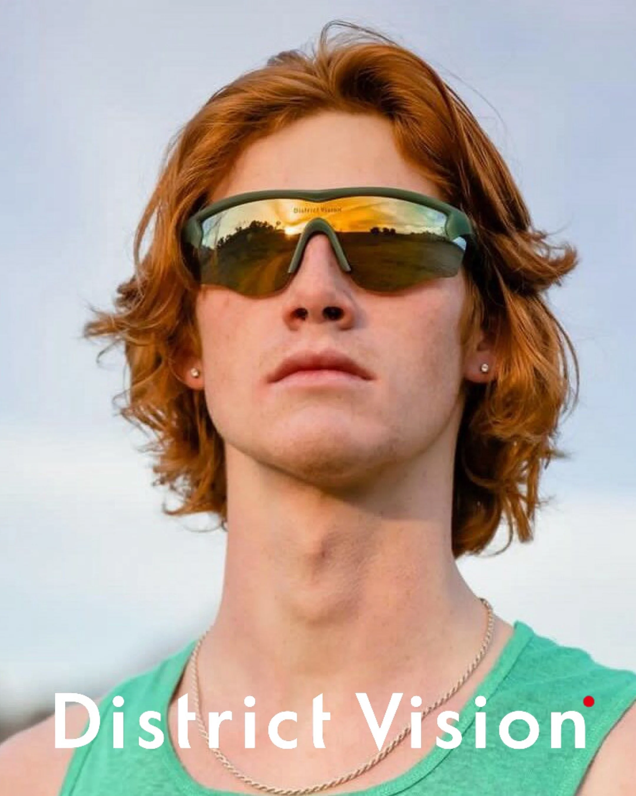 Sporty man wearing District Vision sunglasses