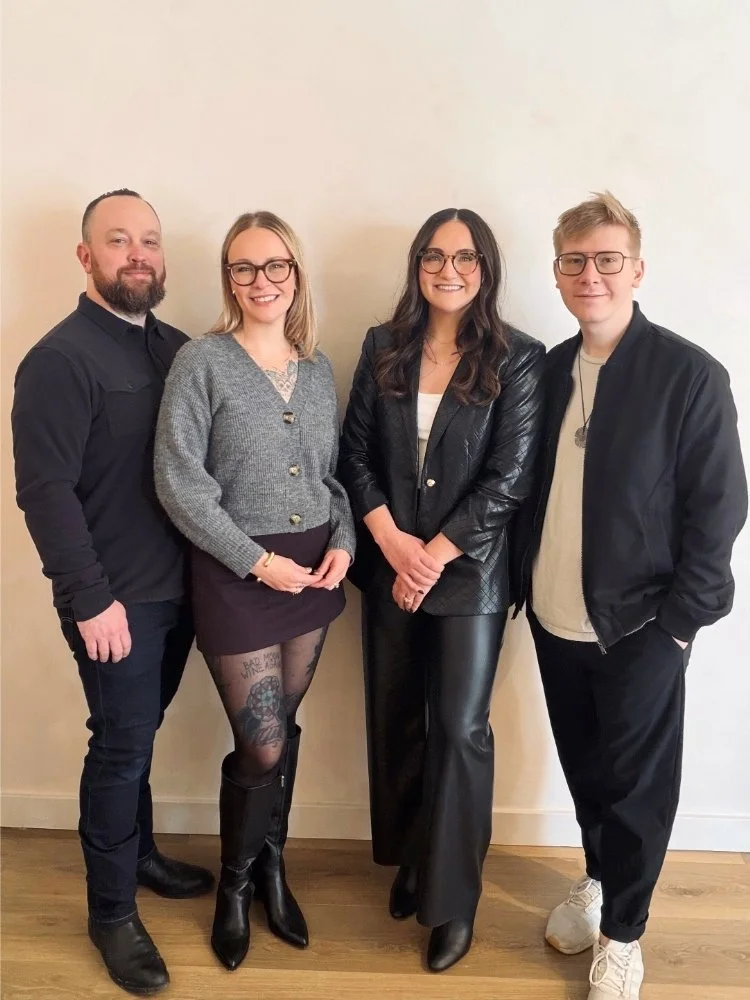 The Ra Opticians team stands together. From left to right, Lyle, Jessica, Sydney, Nathaniel