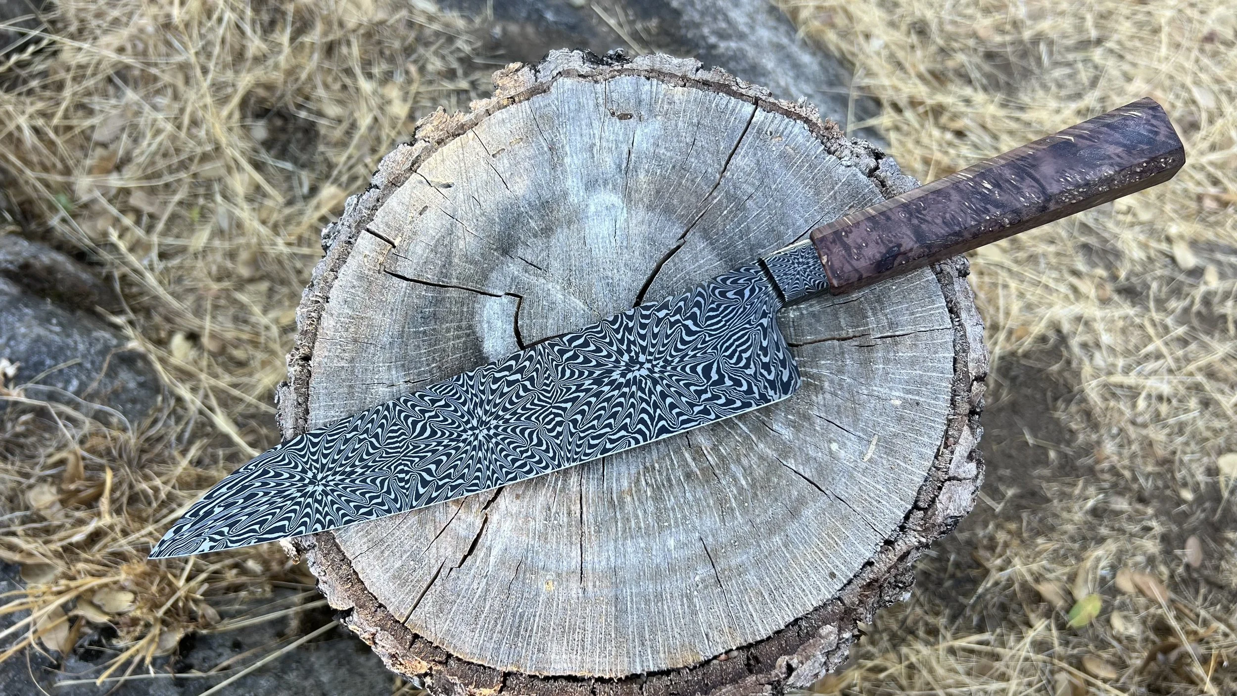 Mosaic chefs knife with integral bolster