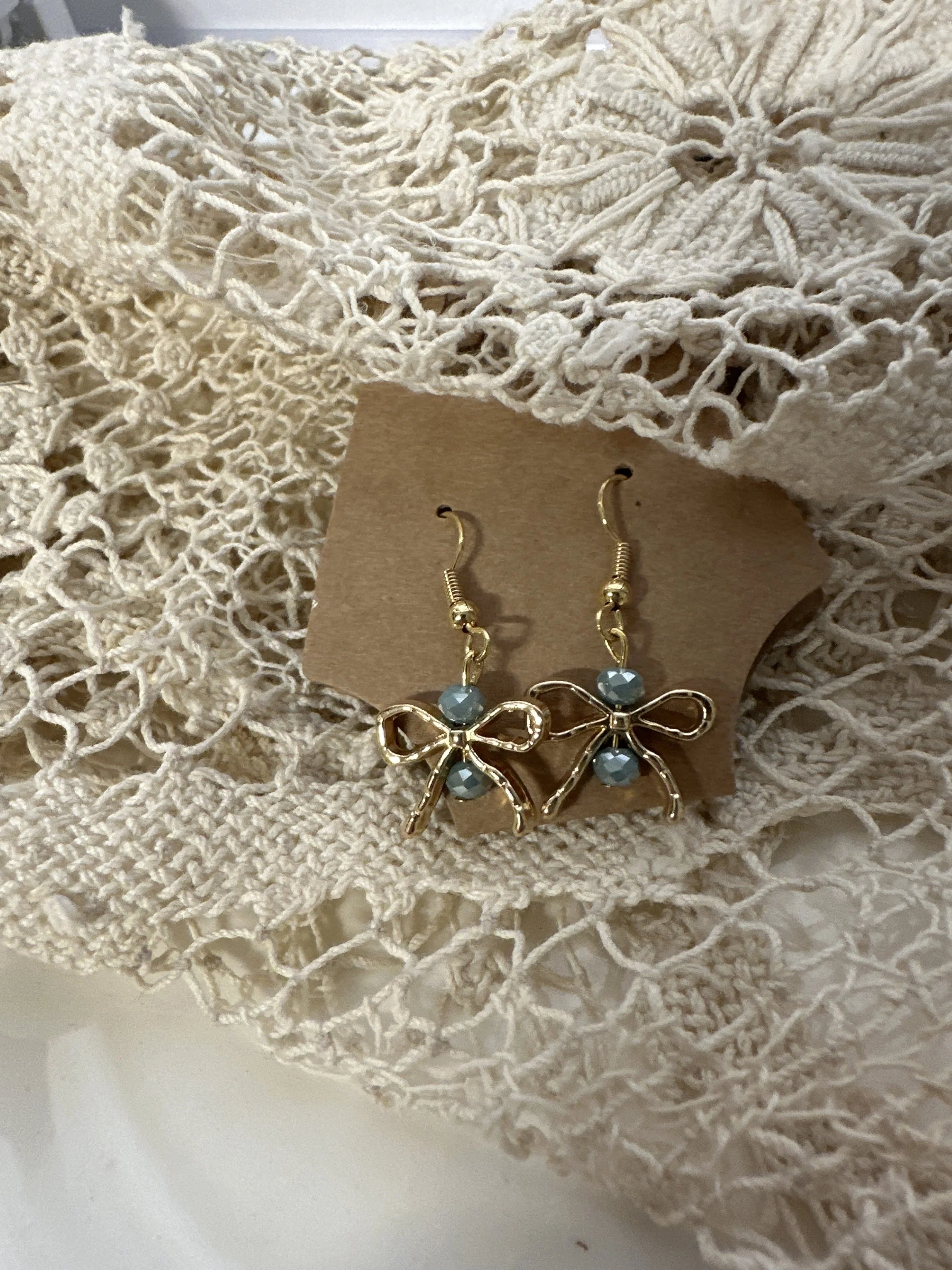 Turquoise love shack fancee gold bow earrings