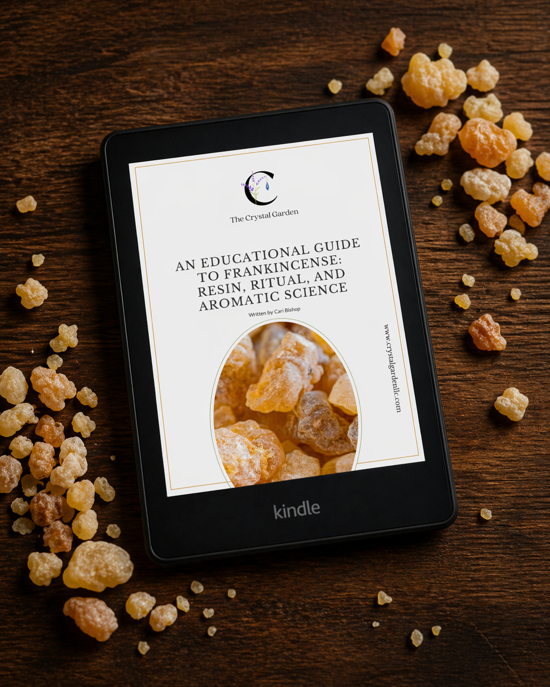 An educational guide to frankincese loaded on a kindle surrounded by frankincense resin