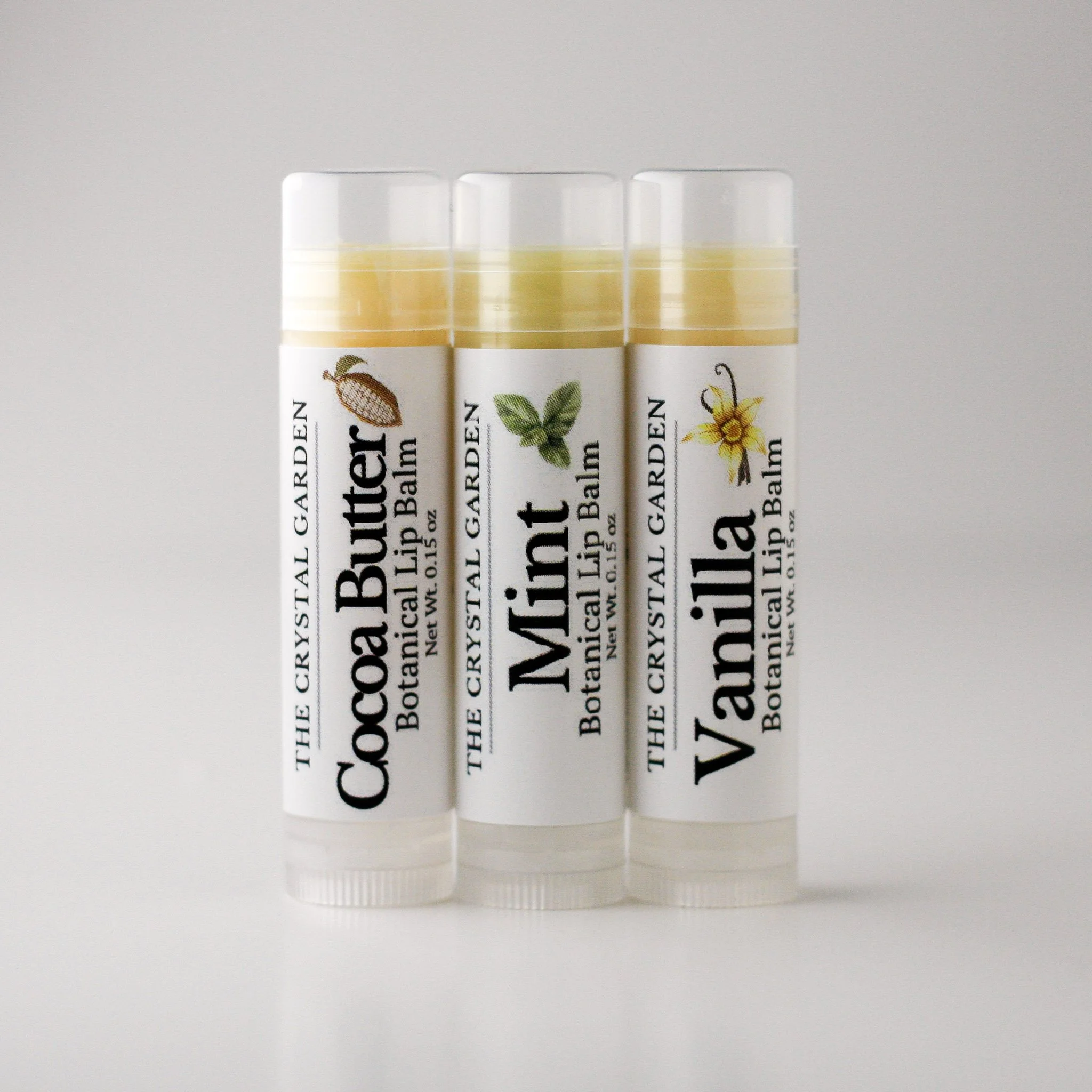 Bulk lip balm favors in vanilla, cocoa butter, and mint, available for baby showers, weddings, and event gift bags.