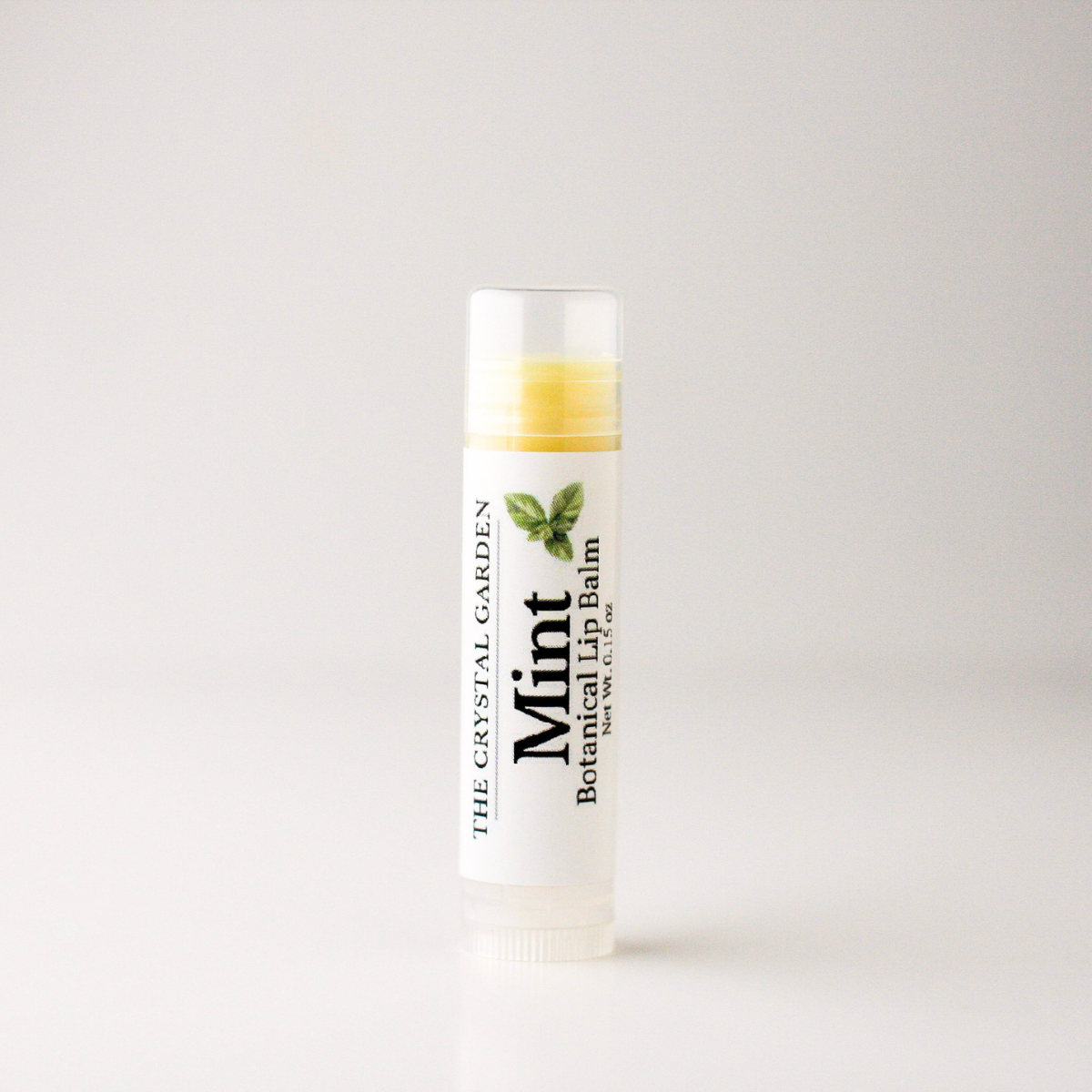 Bulk lip balm favors in vanilla, cocoa butter, and mint, available for baby showers, weddings, and event gift bags.