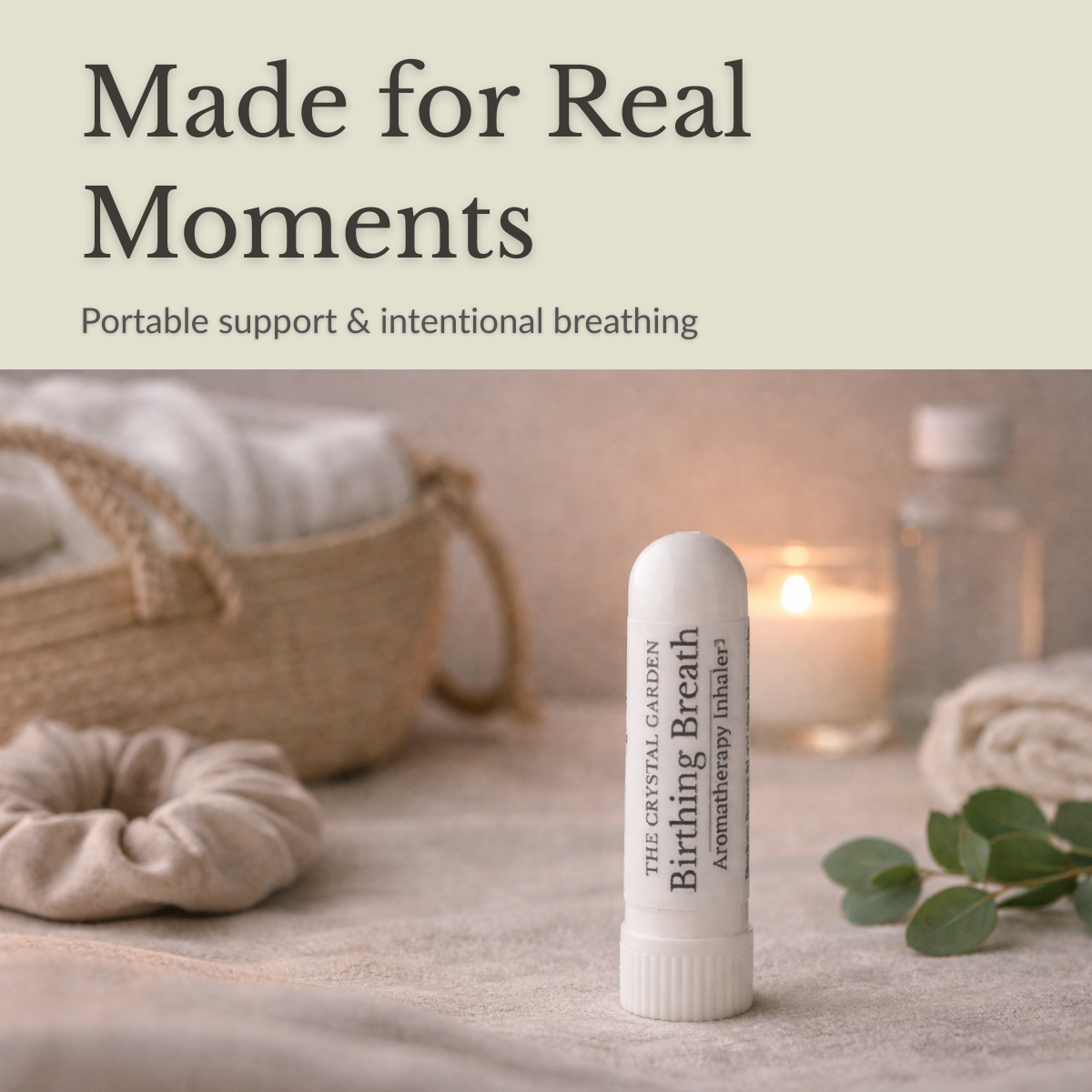 Birthing Breath aromatherapy inhaler by The Crystal Garden resting beside soft linens and candlelight in a calming birth space.