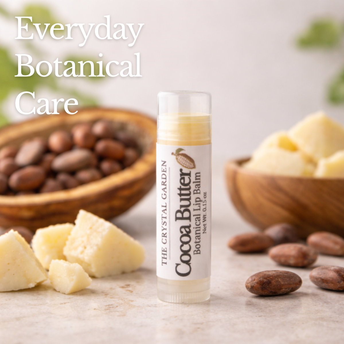 The Crystal Garden Cocoa Butter Botanical Lip Balm with cocoa butter and cocoa beans