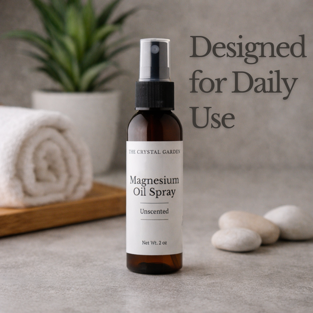 Magnesium oil spray in amber bottle with black spray top by The Crystal Garden. Designed for daily use