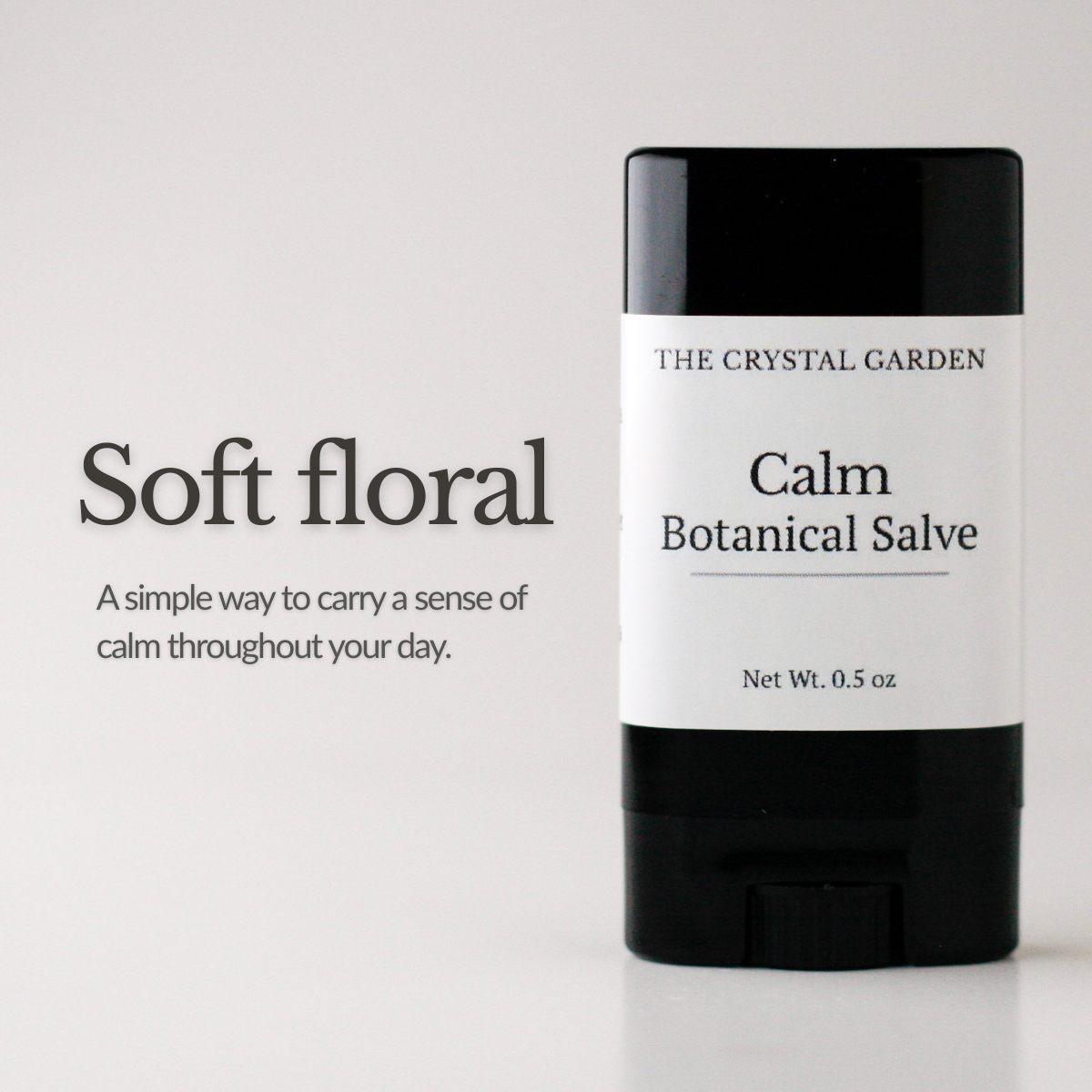 Calm Botanical Salve in a black 0.5 oz twist-up tube with minimal label on a soft neutral background salves, suporting photo(16).png