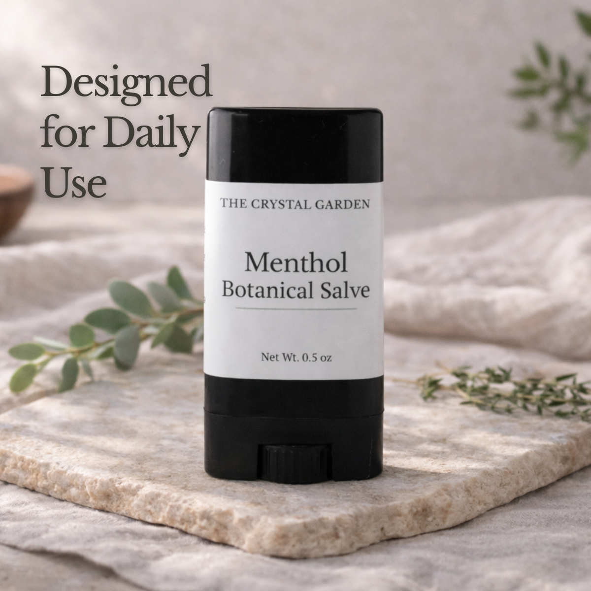 Menthol salve displayed in a natural setting with soft botanical elements for everyday care