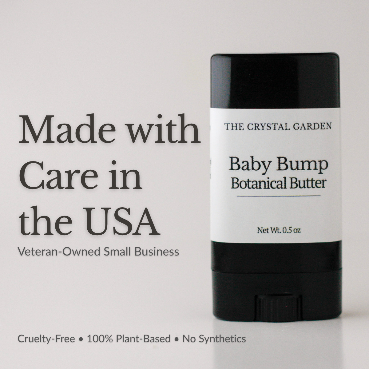Baby Bump Botanical Butter pregnancy belly butter in a black twist-up tube with minimalist label on a white background. Made In USA, a veteran owned small company