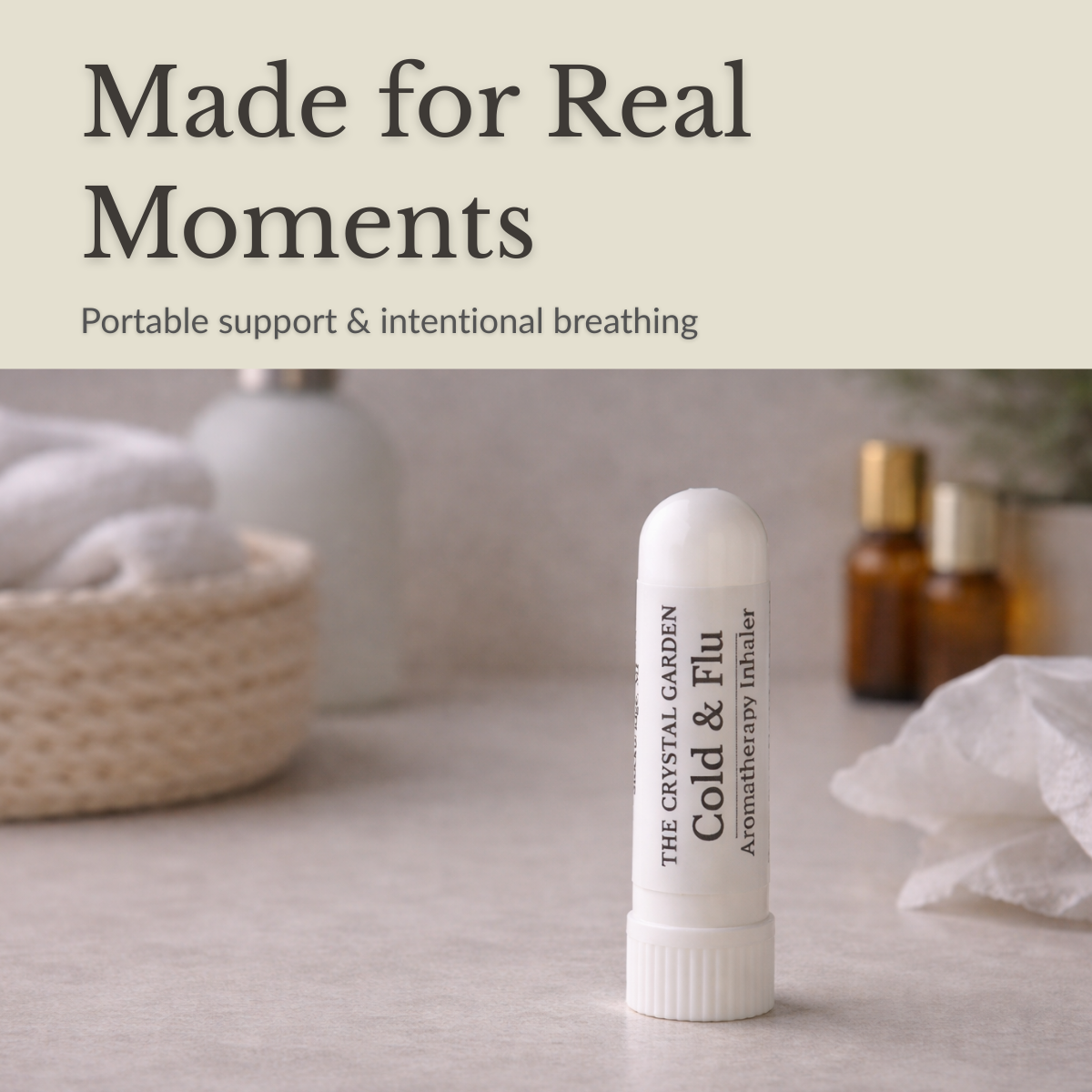 Cold & Flu aromatherapy inhaler on a bathroom counter with towels, amber bottles, and tissues in a calm seasonal wellness setting.